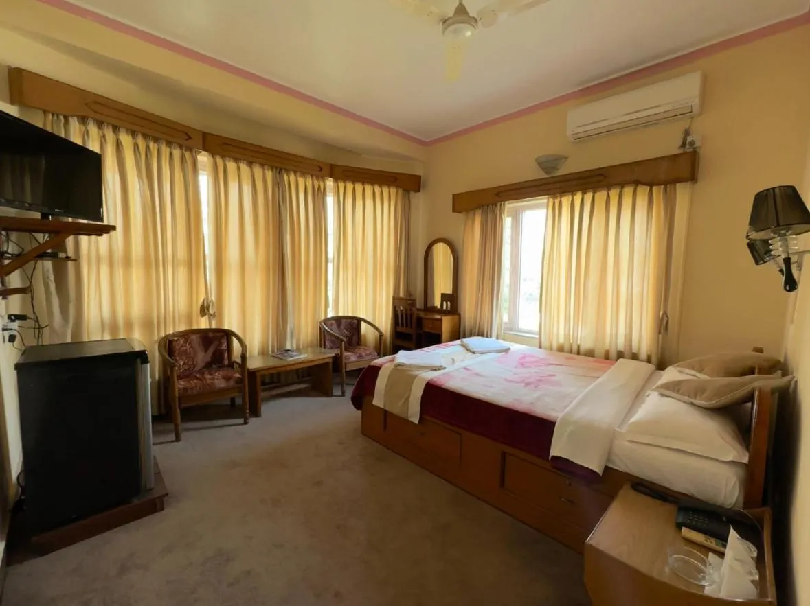 Bed in Green Tara Hotel