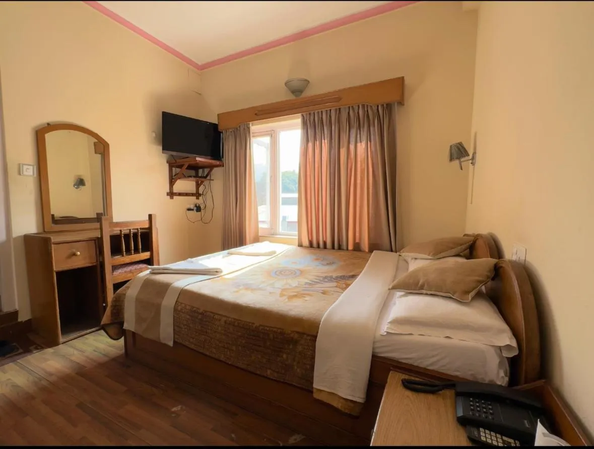 Bed in Green Tara Hotel