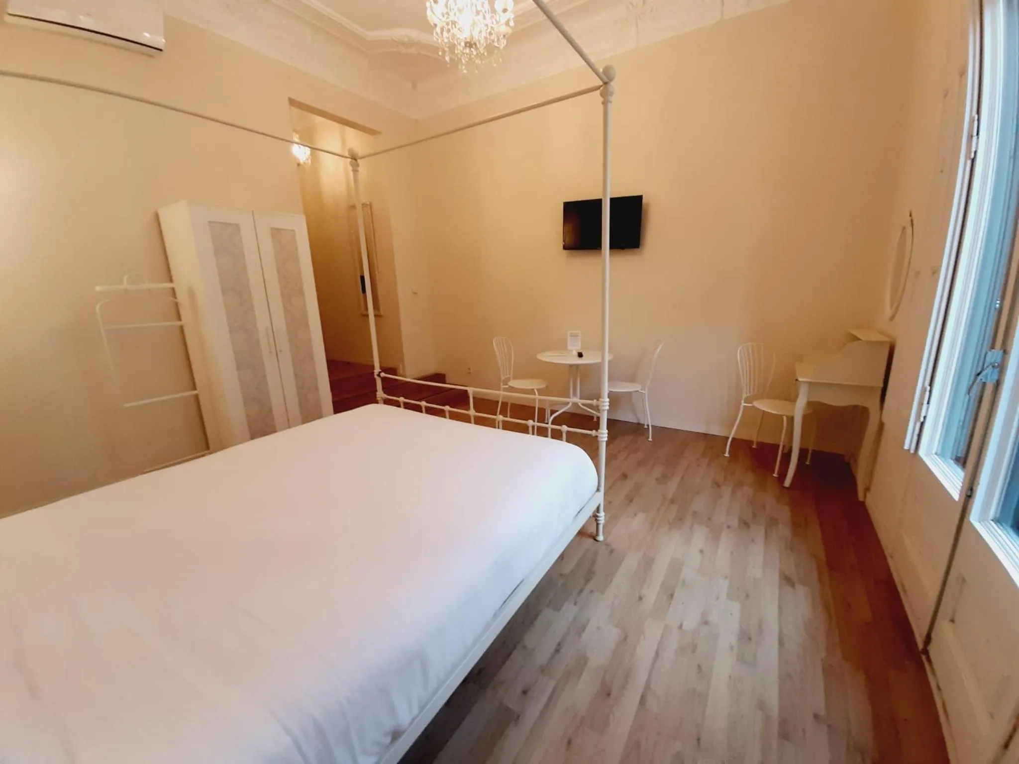 Bed in Lumine Luxury Suites by gaiarooms