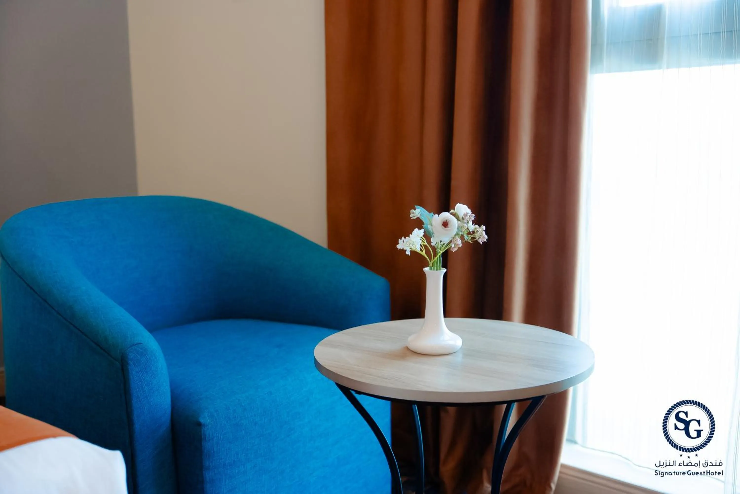 Seating area in Signature Guest Hotel فندق إمضاء النزيل الفندقية