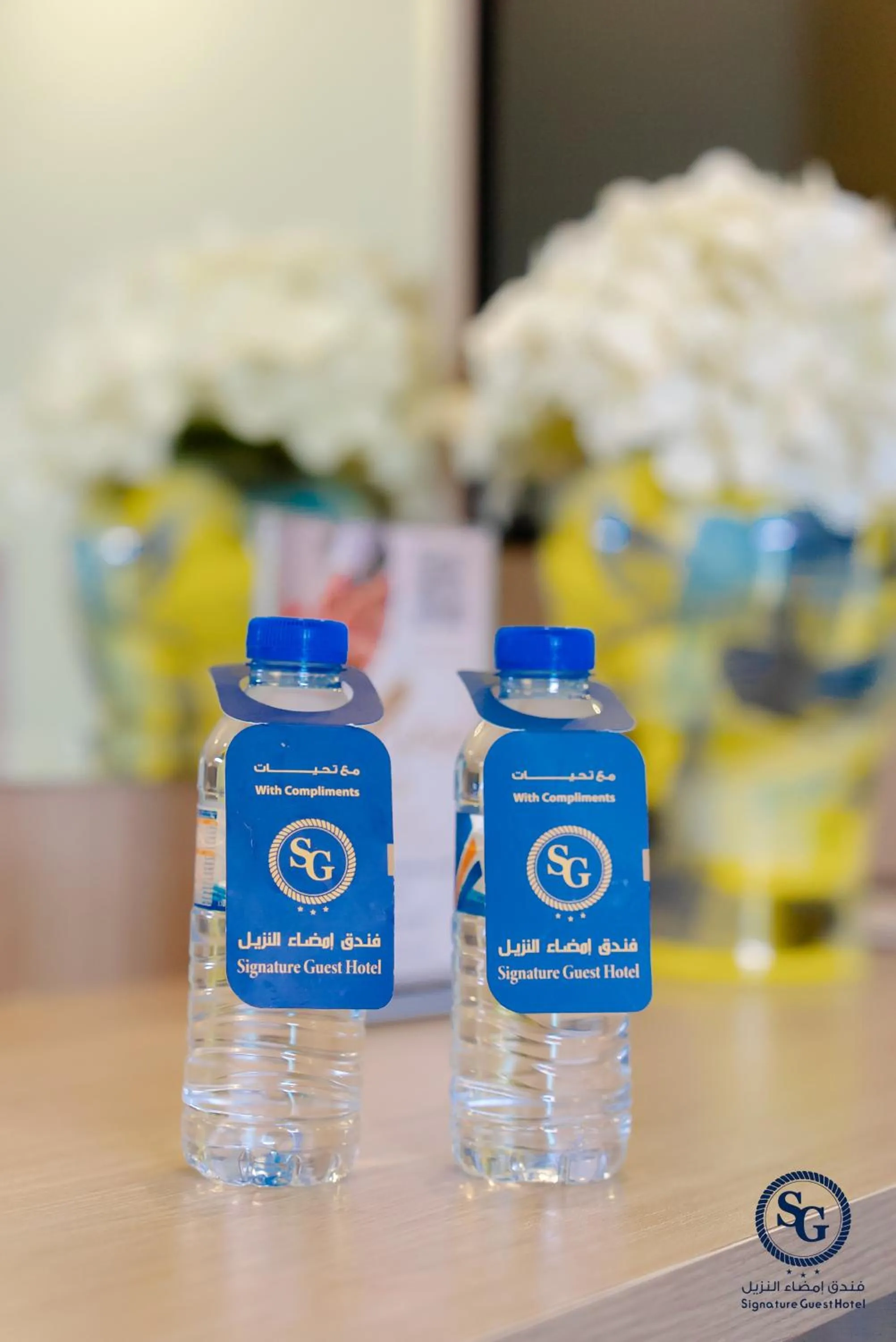 Property logo or sign in Signature Guest Hotel فندق إمضاء النزيل الفندقية