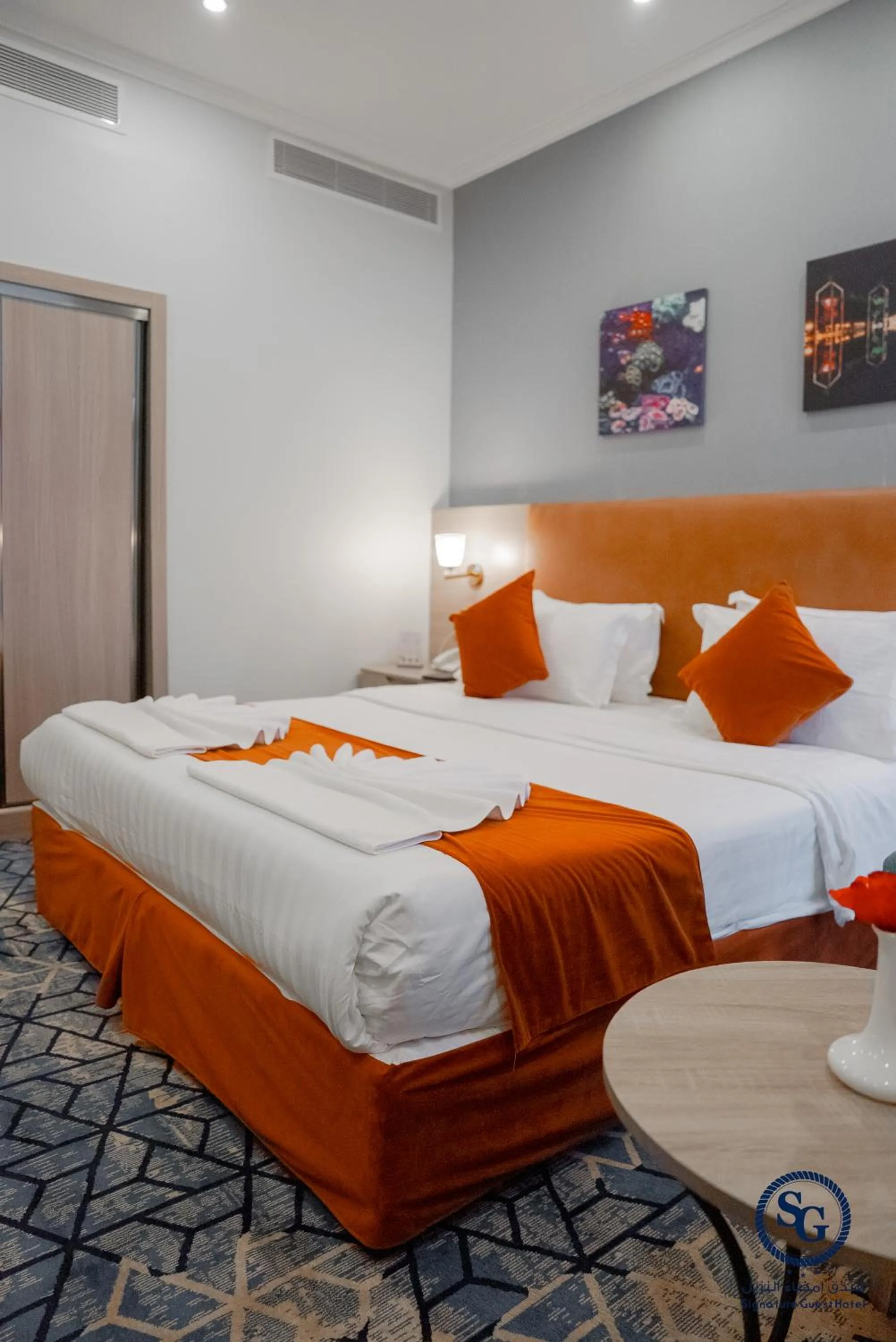 Bed in Signature Guest Hotel فندق إمضاء النزيل الفندقية