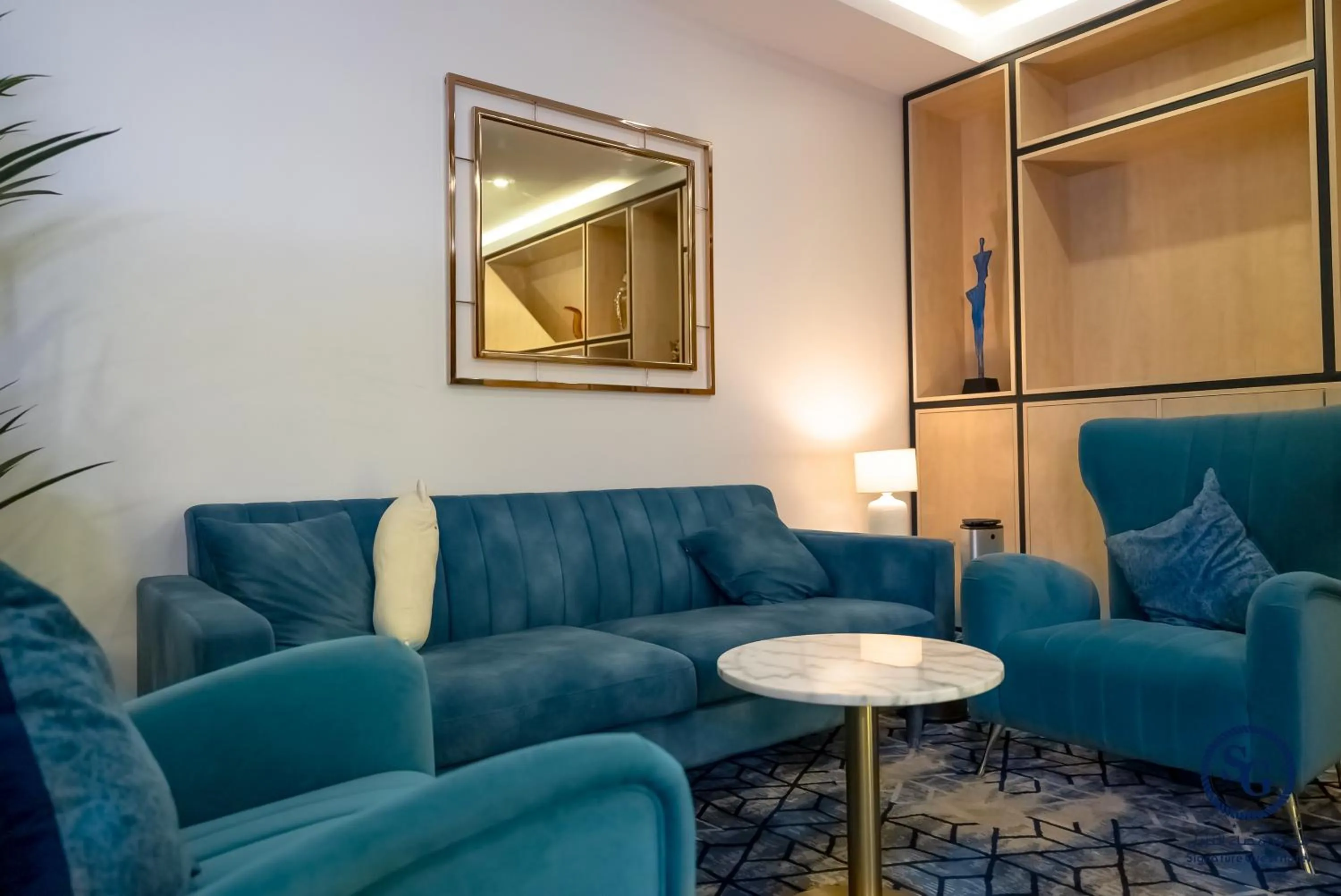 Seating area in Signature Guest Hotel فندق إمضاء النزيل الفندقية