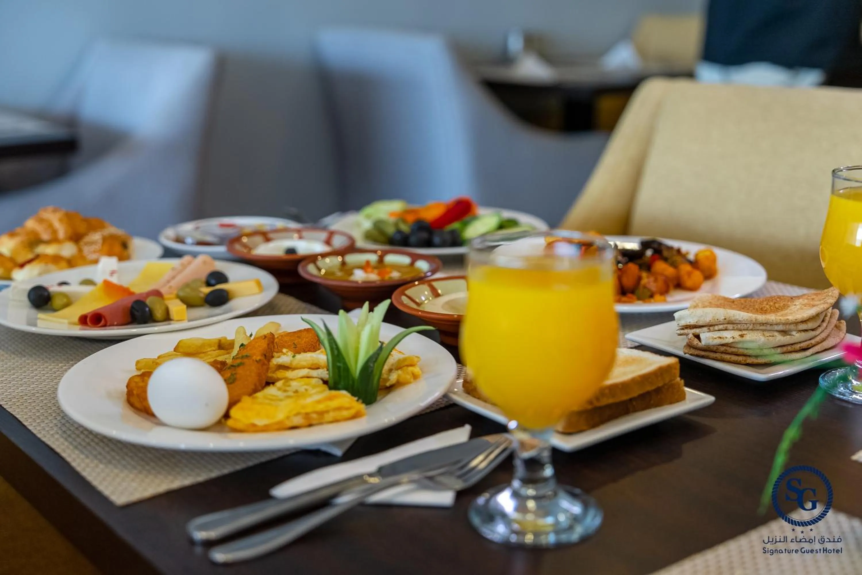 Breakfast in Signature Guest Hotel فندق إمضاء النزيل الفندقية