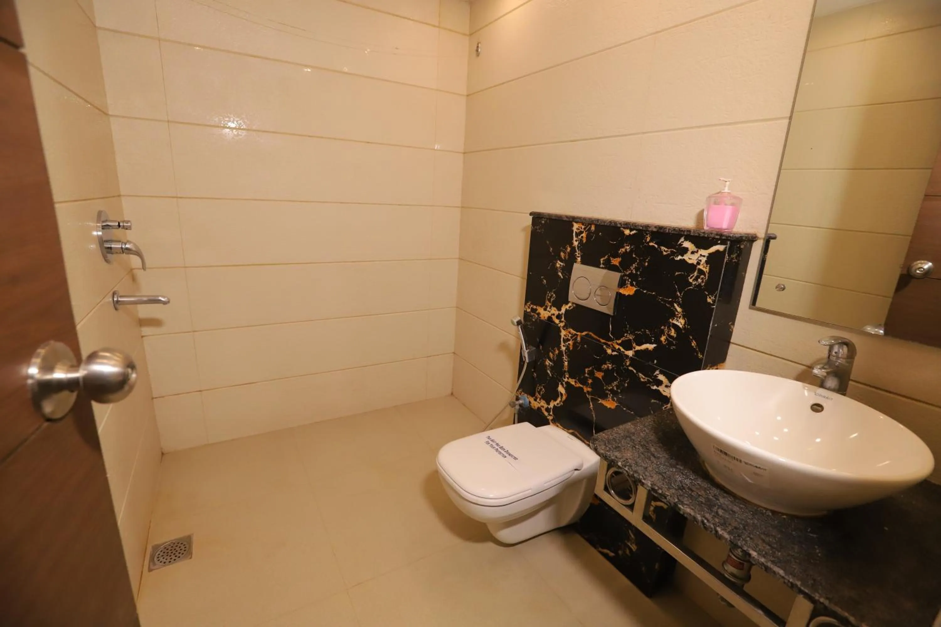 Bathroom in Hotel Mayur Assam - New Delhi Railway Station