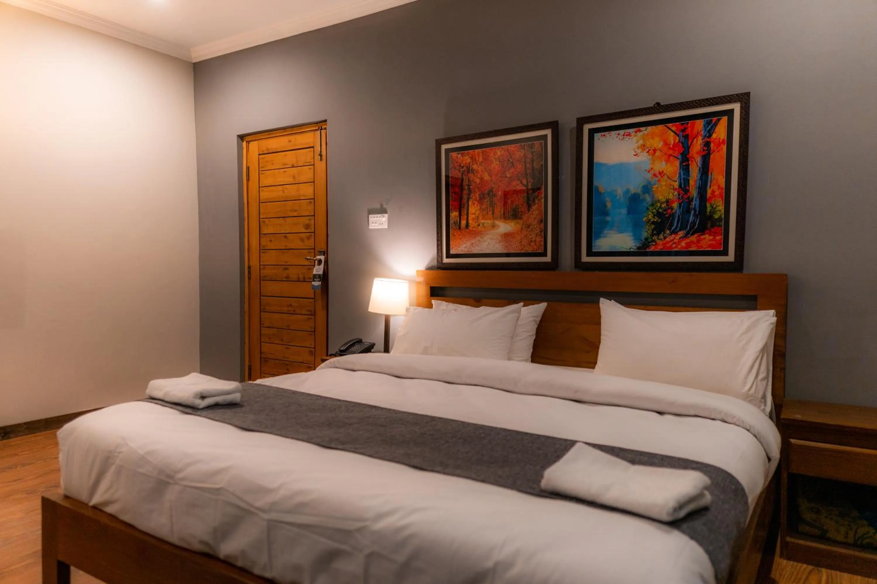 Bed in Dynasty Hotel Skardu