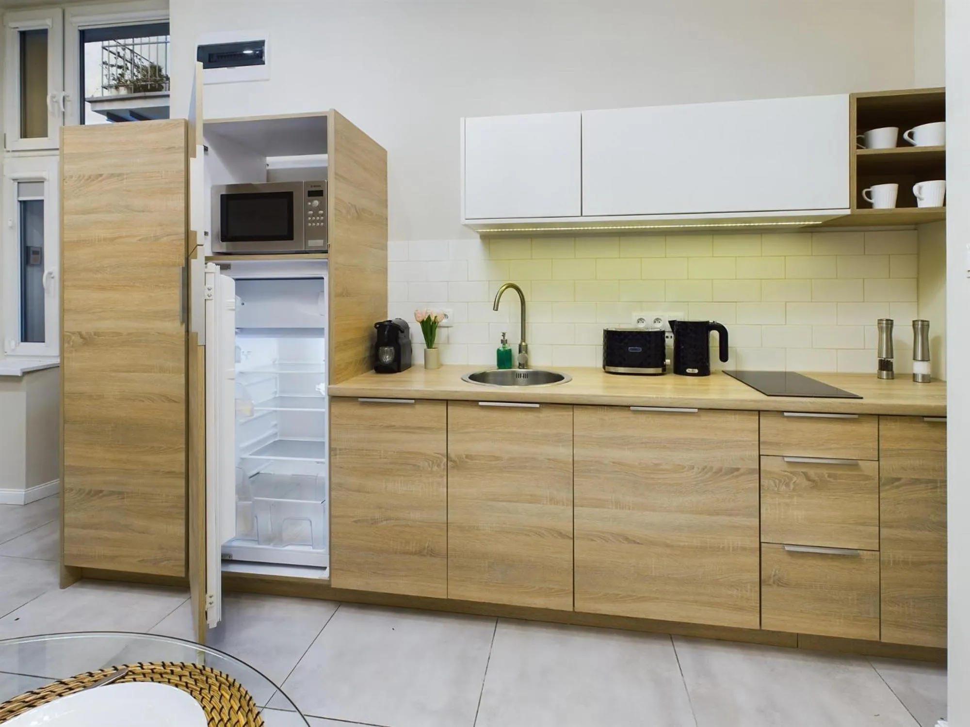 Kitchen or kitchenette in Apartments Dietla Cracow by Noclegi Renters