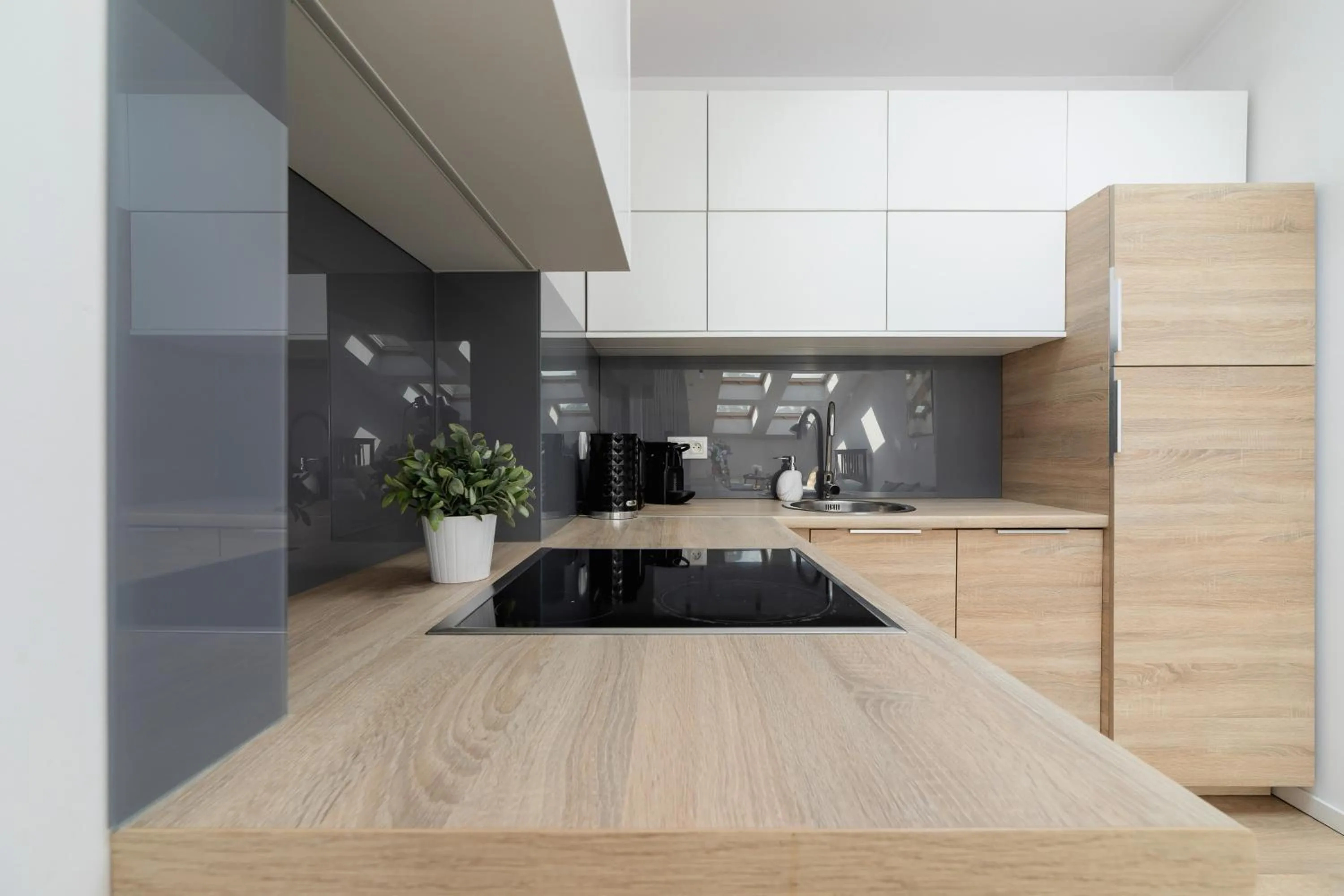 Kitchen or kitchenette in Apartments Dietla Cracow by Noclegi Renters