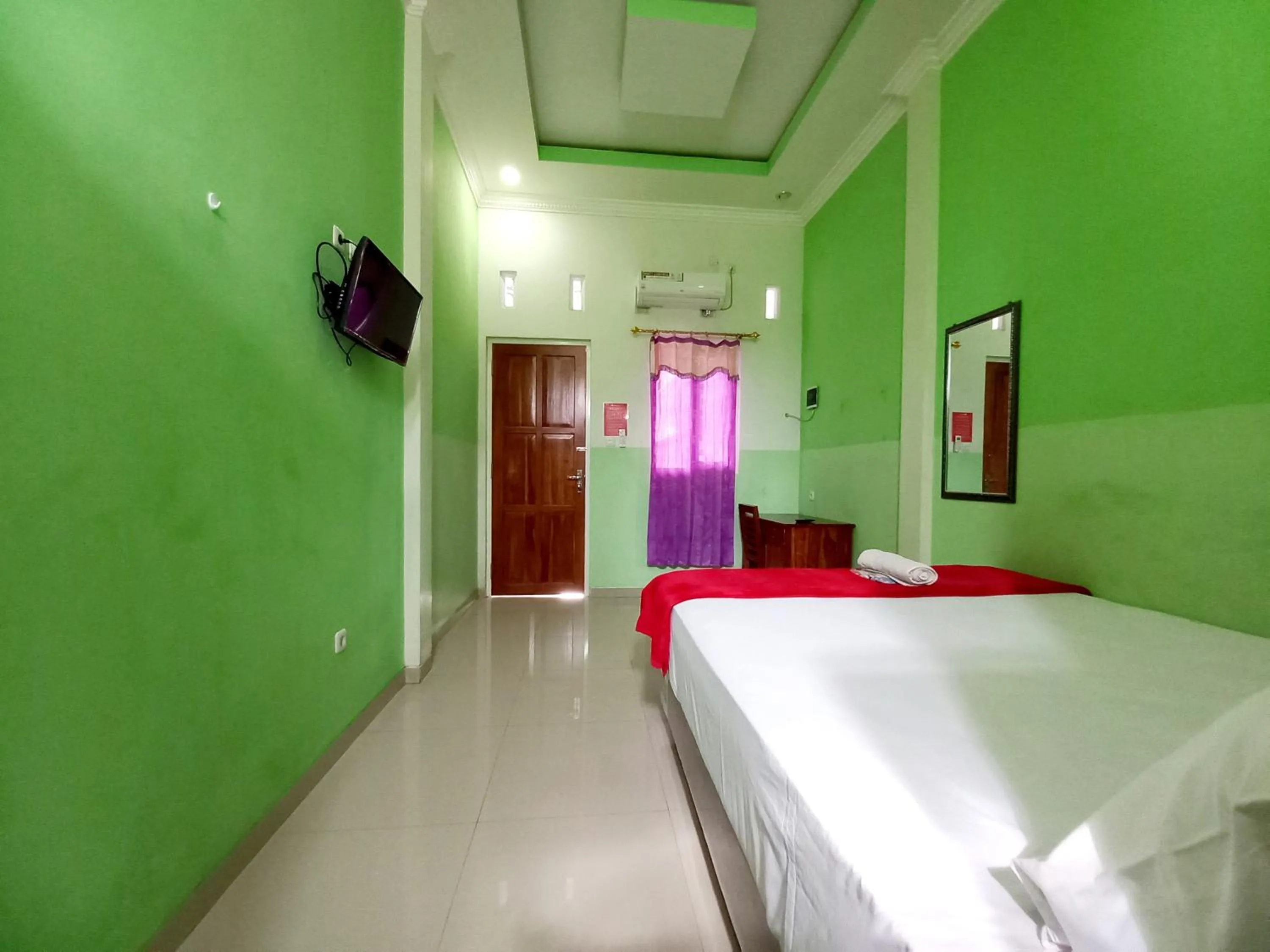 Bed in Harmony House Syariah near Alun Alun Pati Mitra RedDoorz