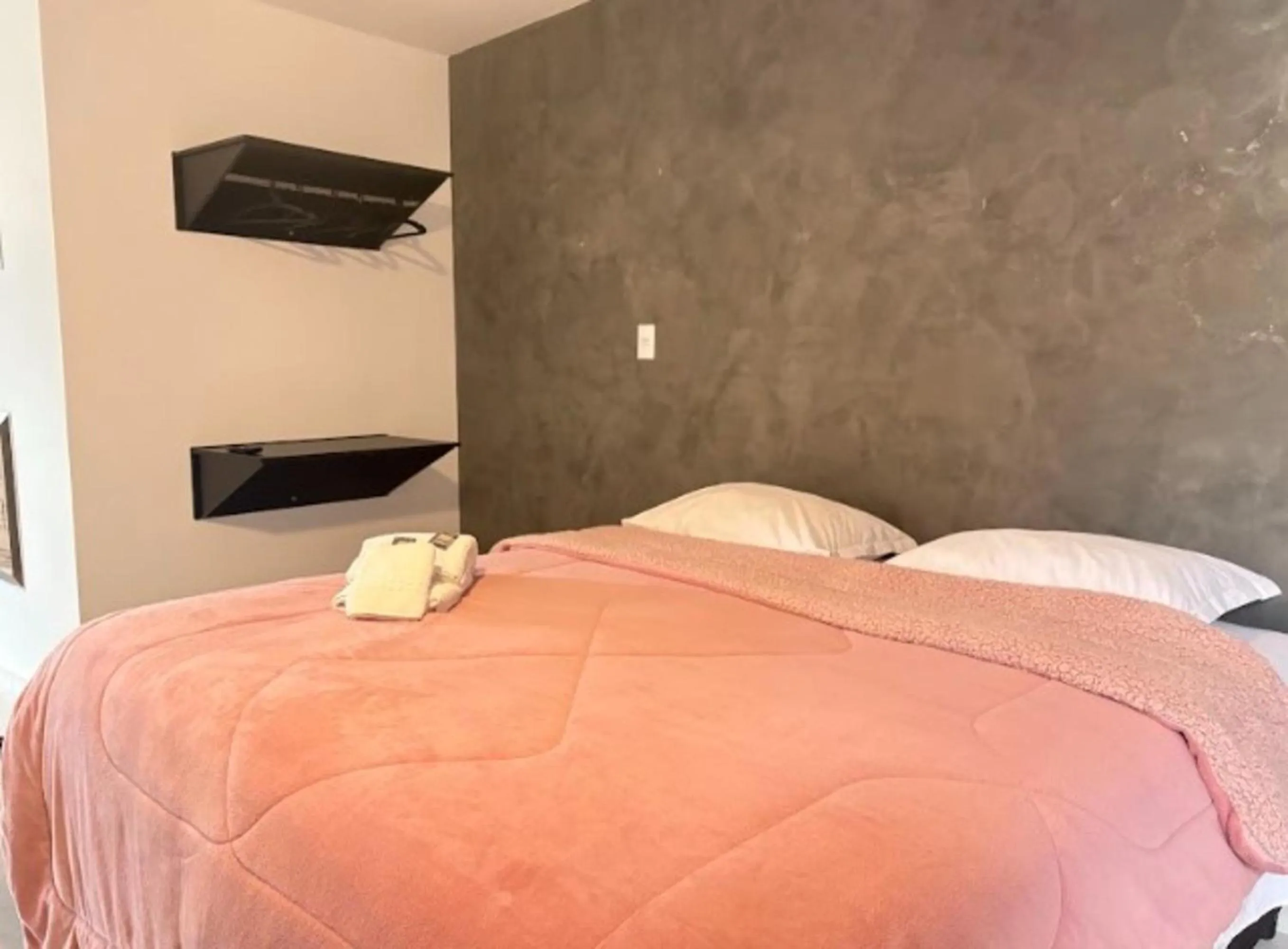 Bed in Pousada Recanto da Cascata