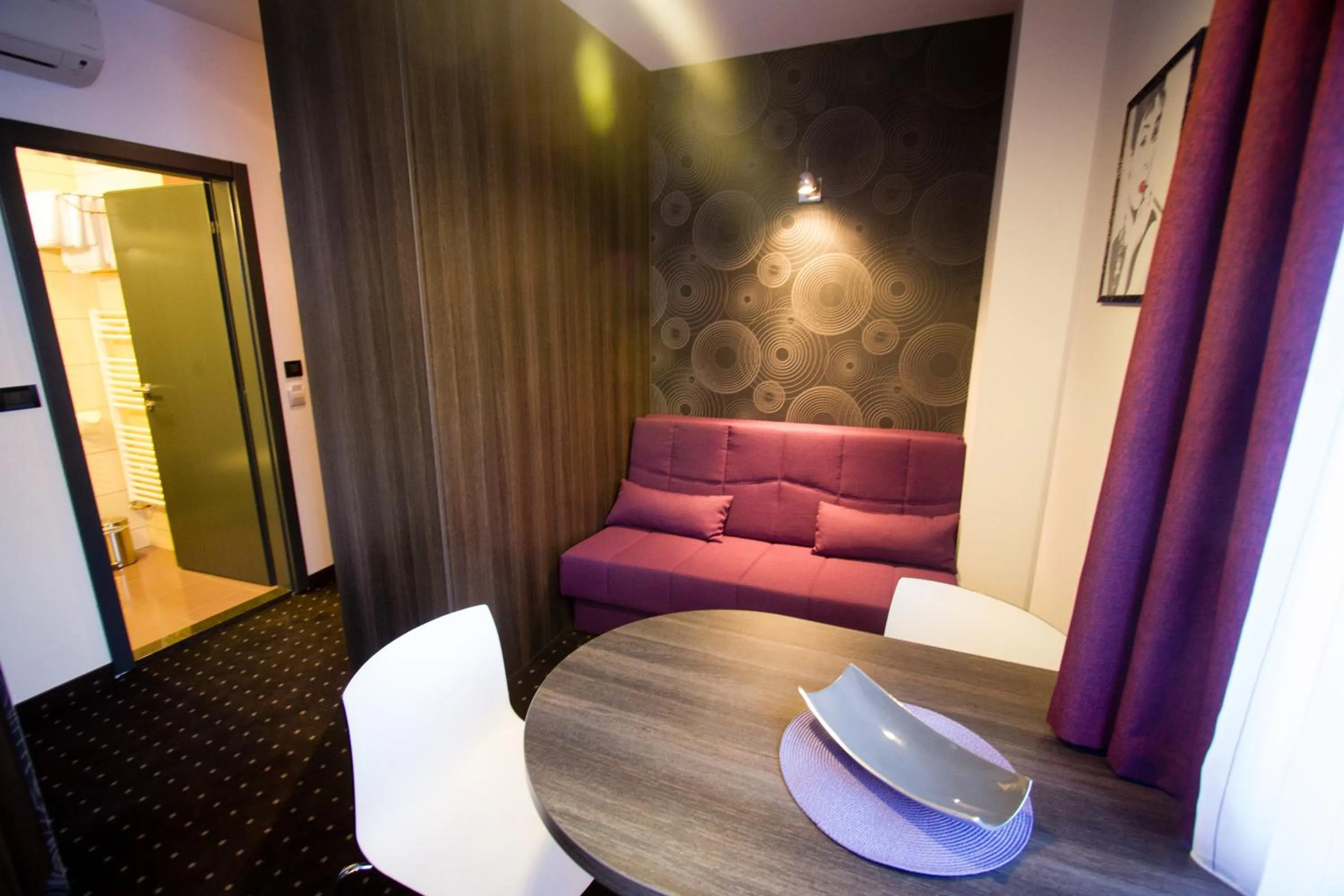 Seating area in Log In Rooms