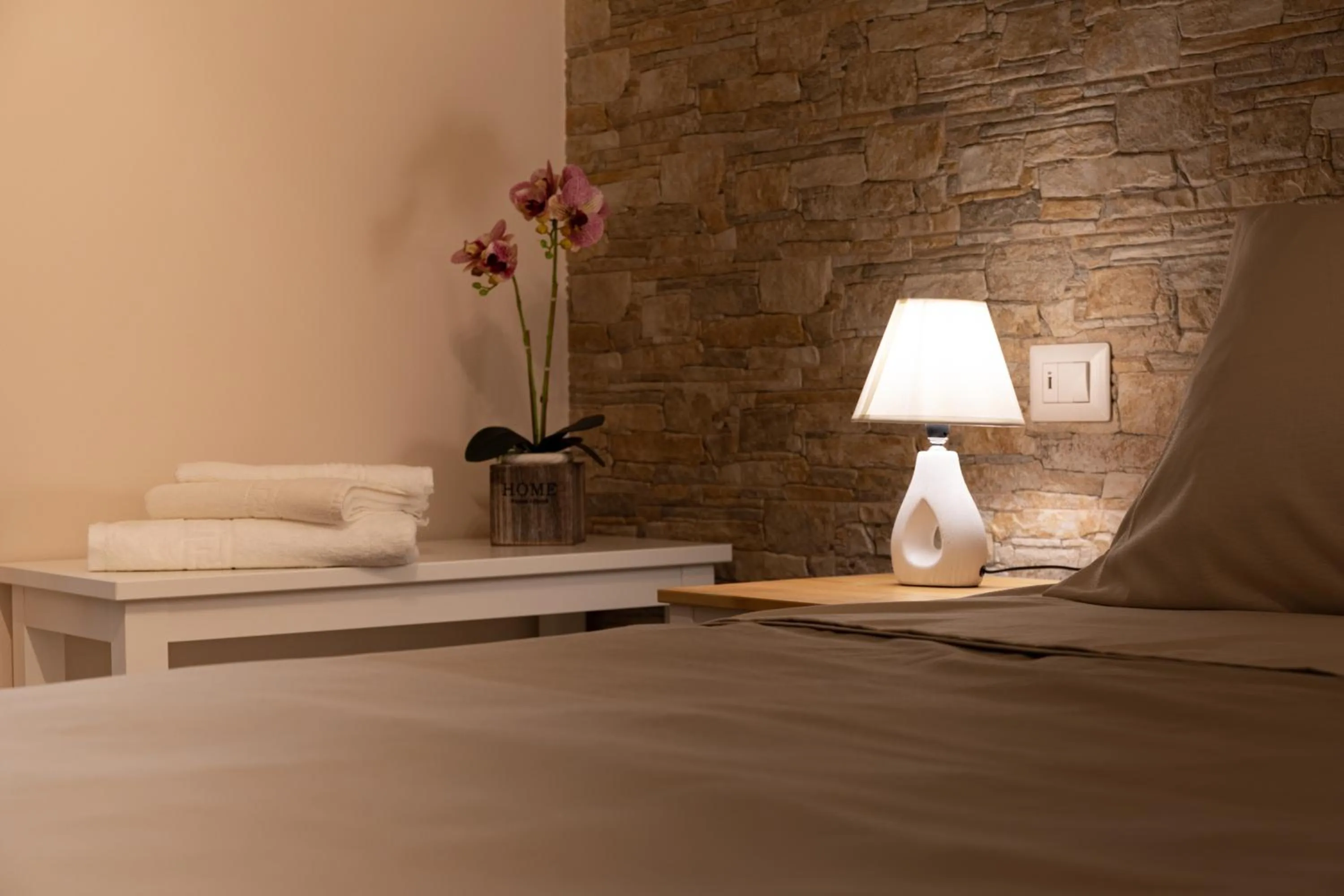 Bed in Tizzy Apartment & Rooms