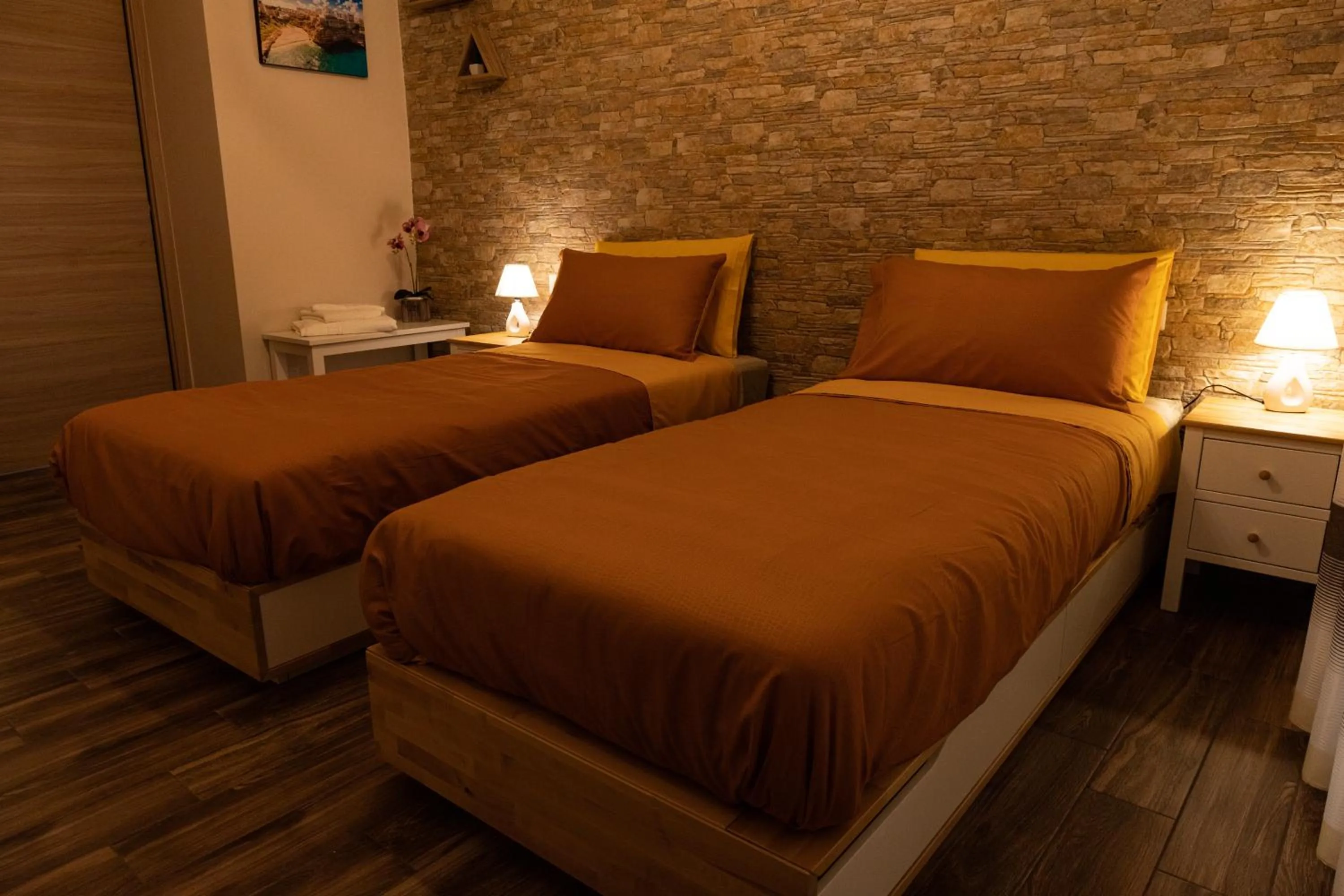 Bed in Tizzy Apartment & Rooms