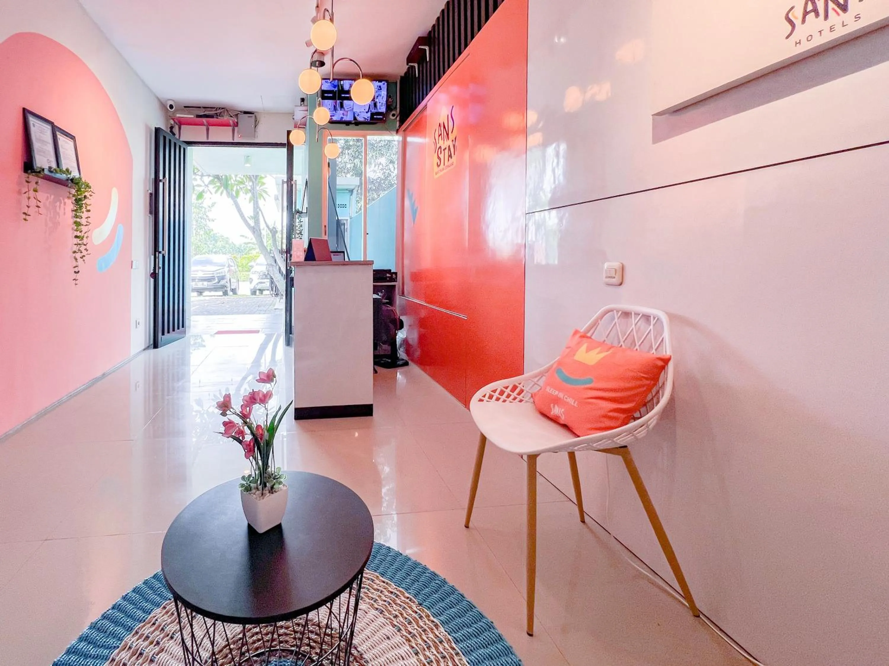 Seating area in Sans Stay Bukit Palma Citraland