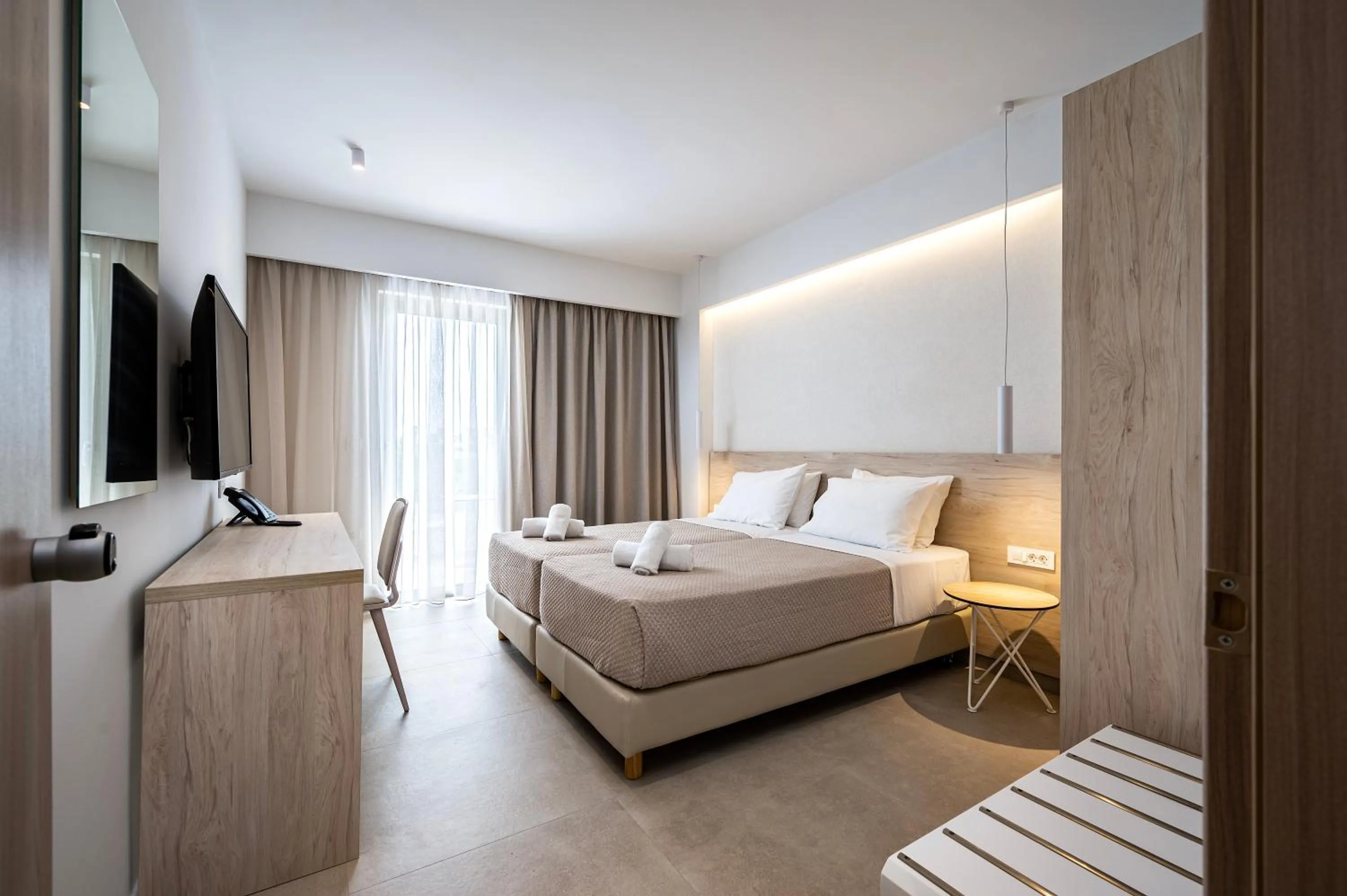 Photo of the whole room, Bed in Mythos Suites Hotel