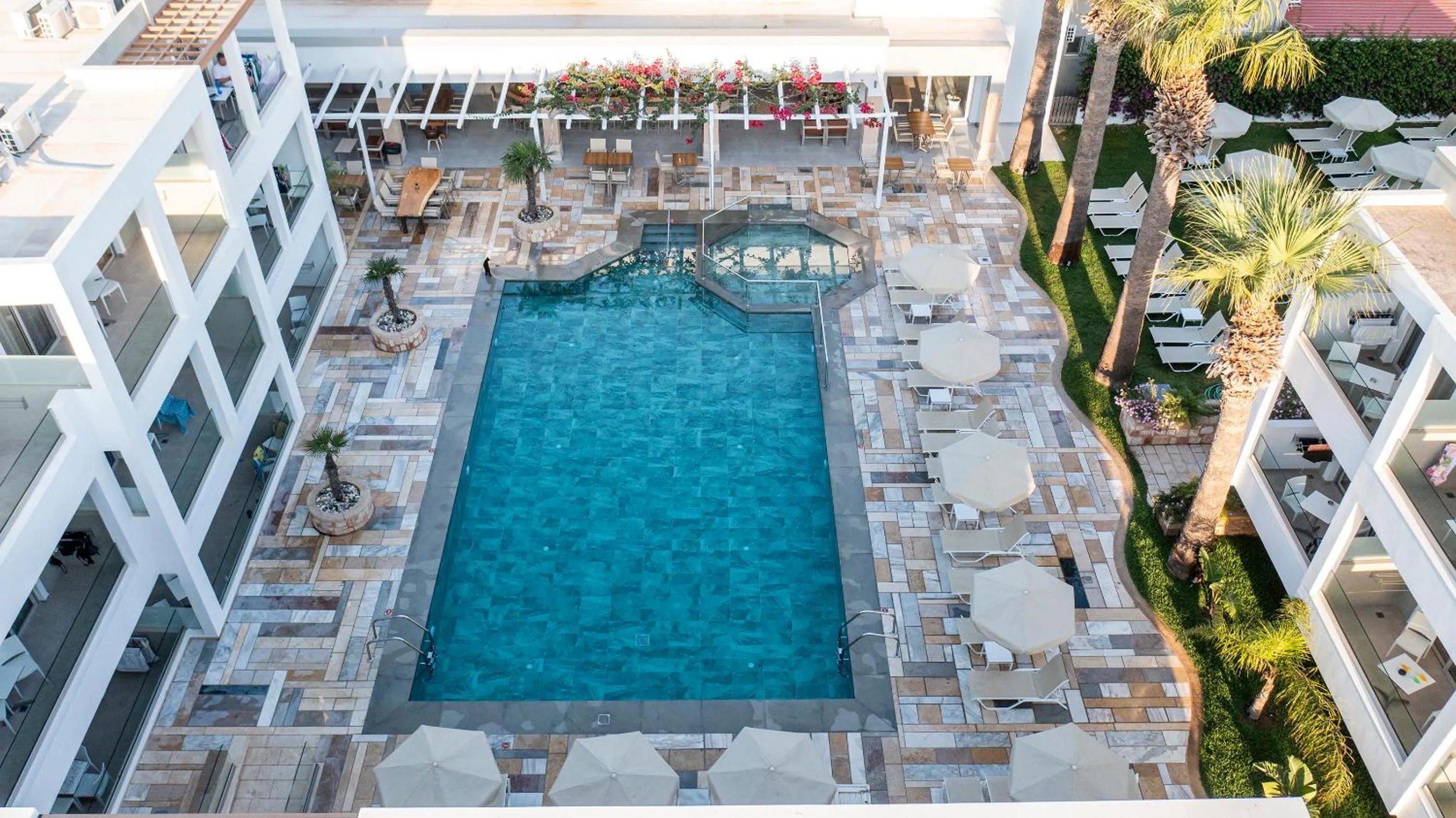 Swimming pool in Mythos Suites Hotel