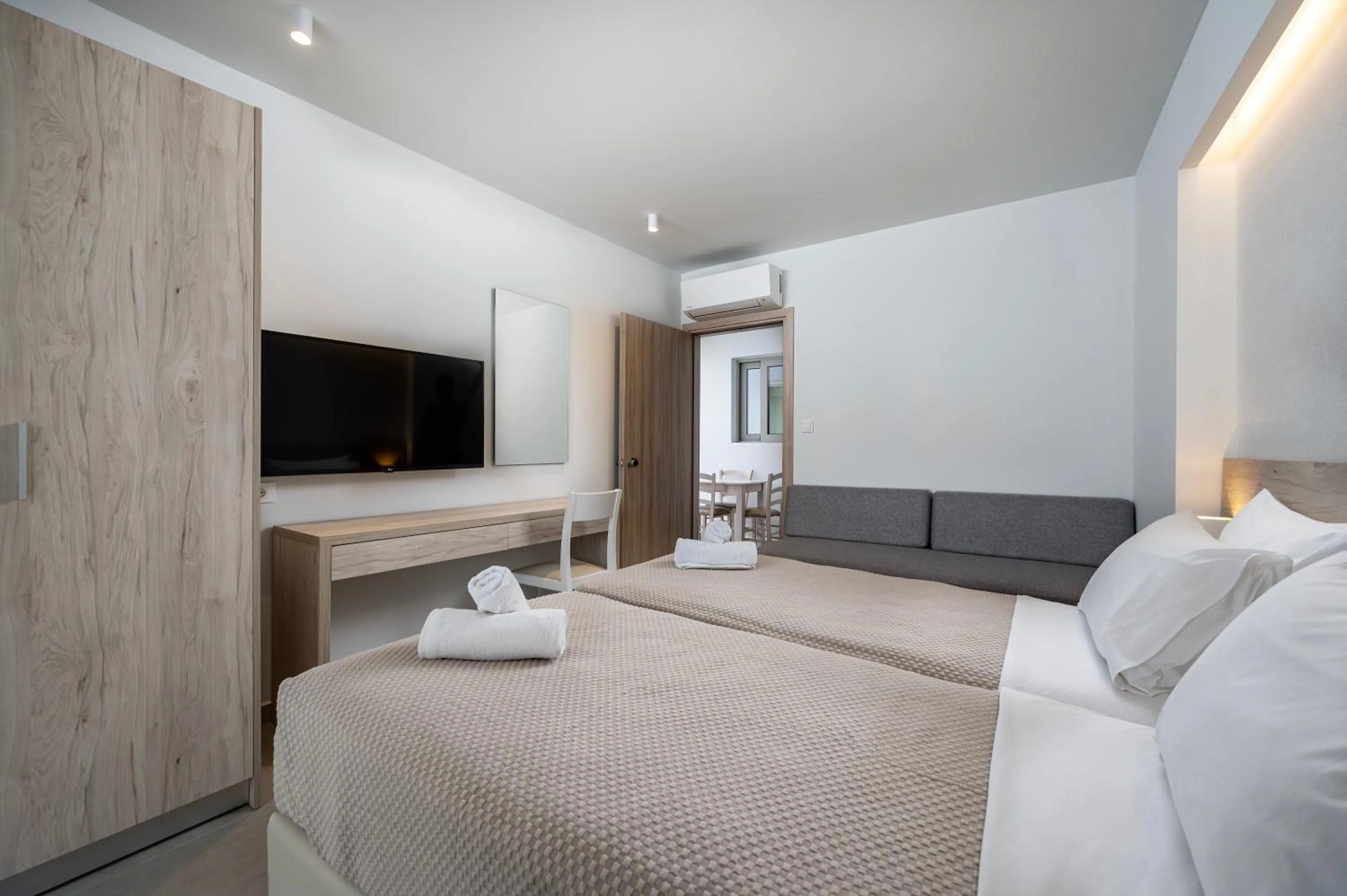 Bedroom, Bed in Mythos Suites Hotel