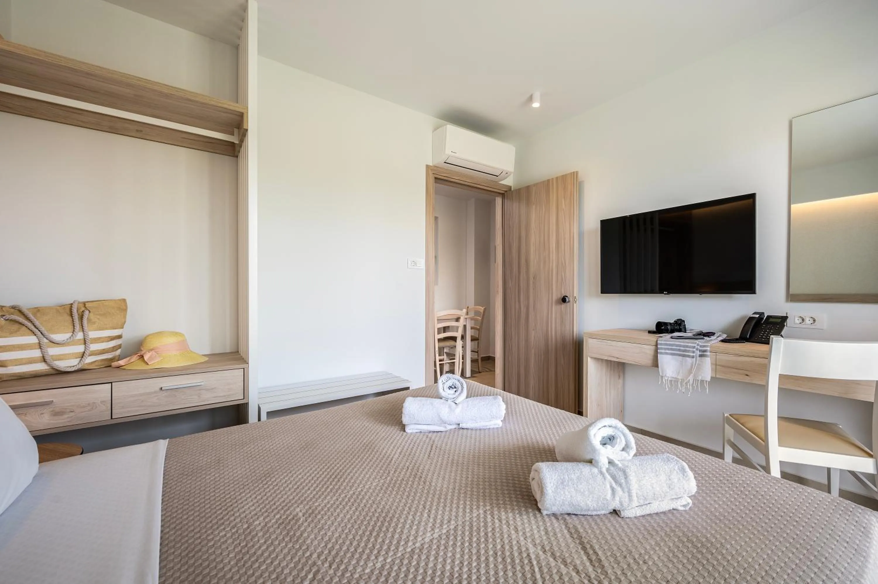 Photo of the whole room, Bed in Mythos Suites Hotel