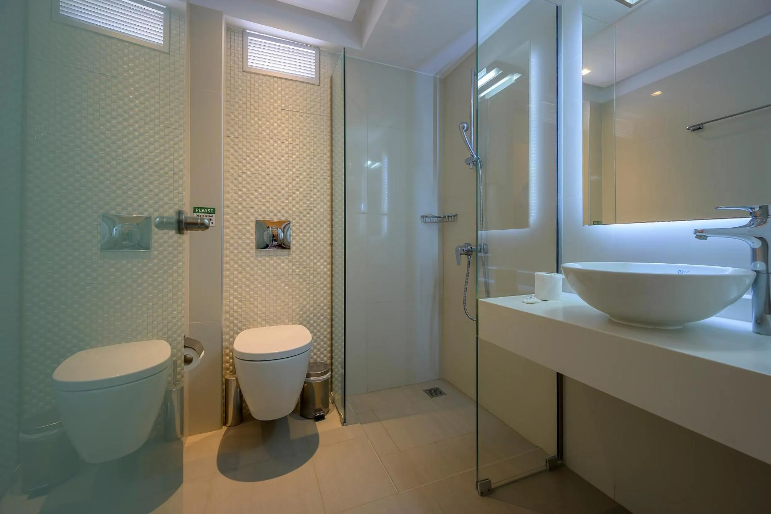 Bathroom in Mythos Suites Hotel