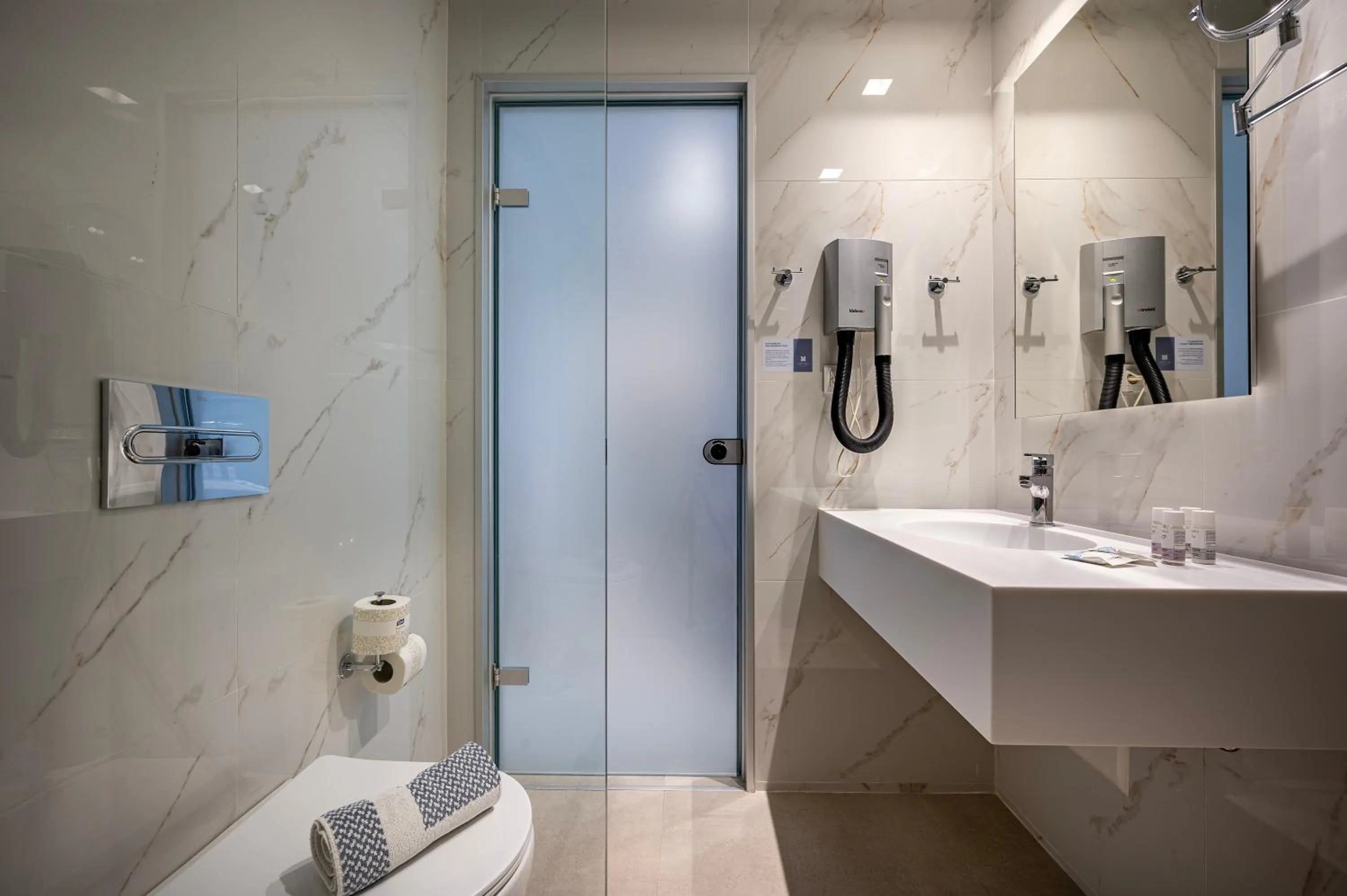 Shower in Mythos Suites Hotel