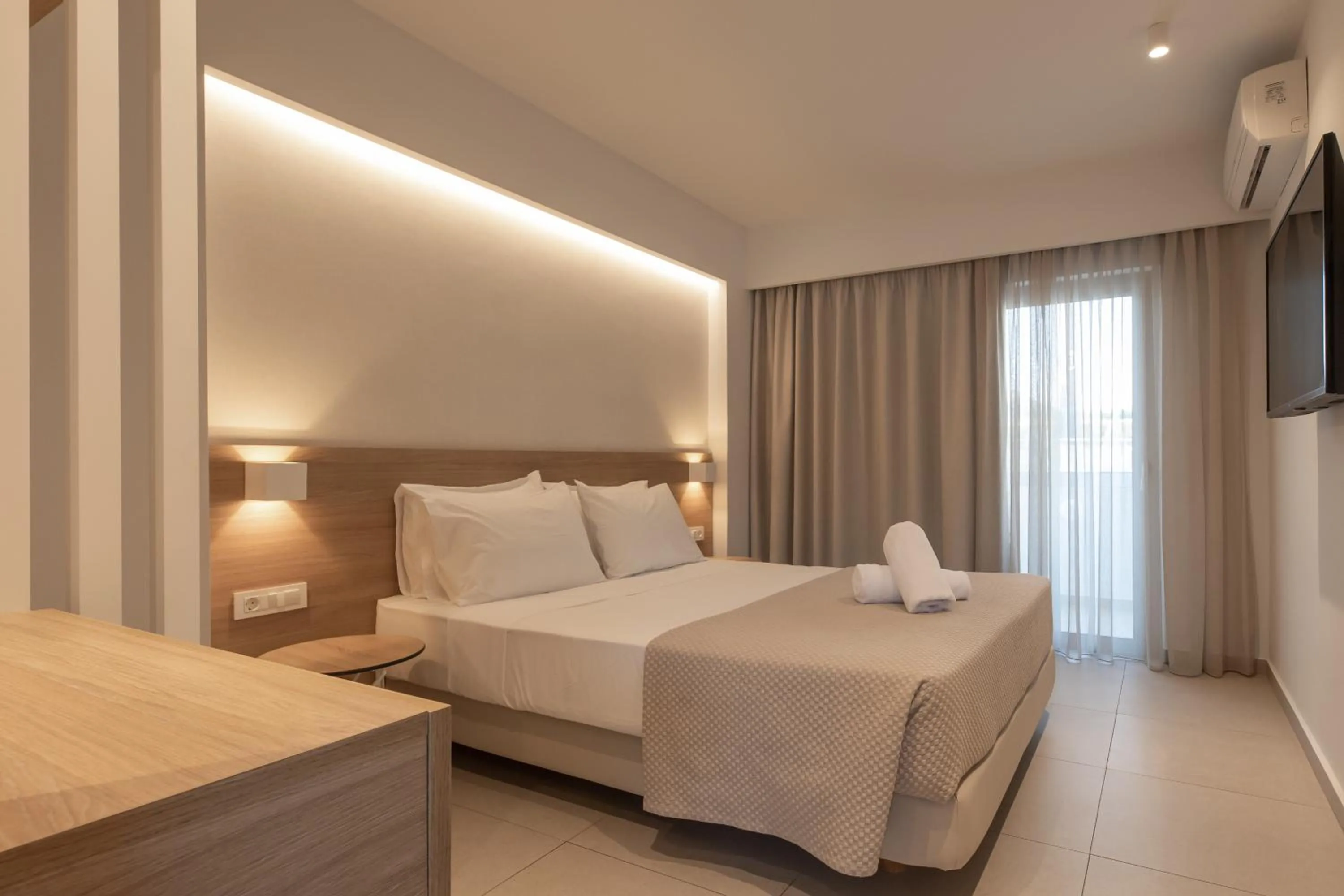 Bedroom, Bed in Mythos Suites Hotel