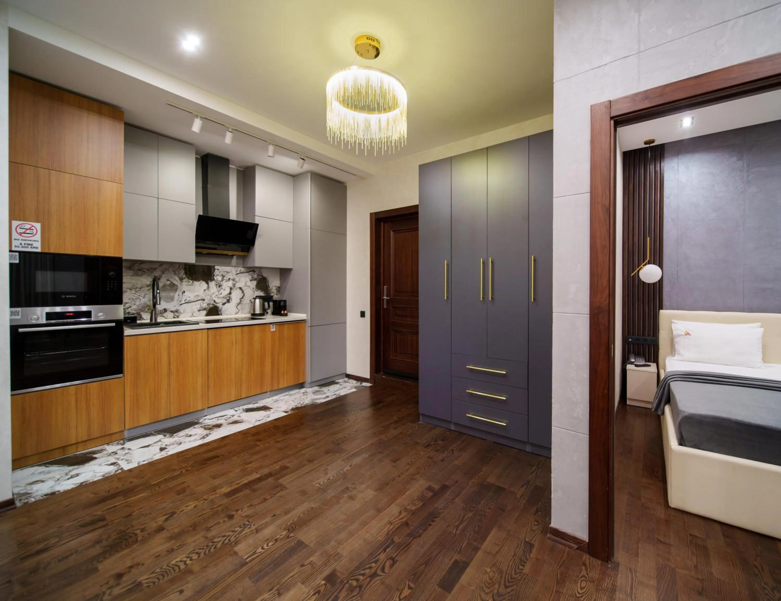 Bed in Arch Apart Hotel