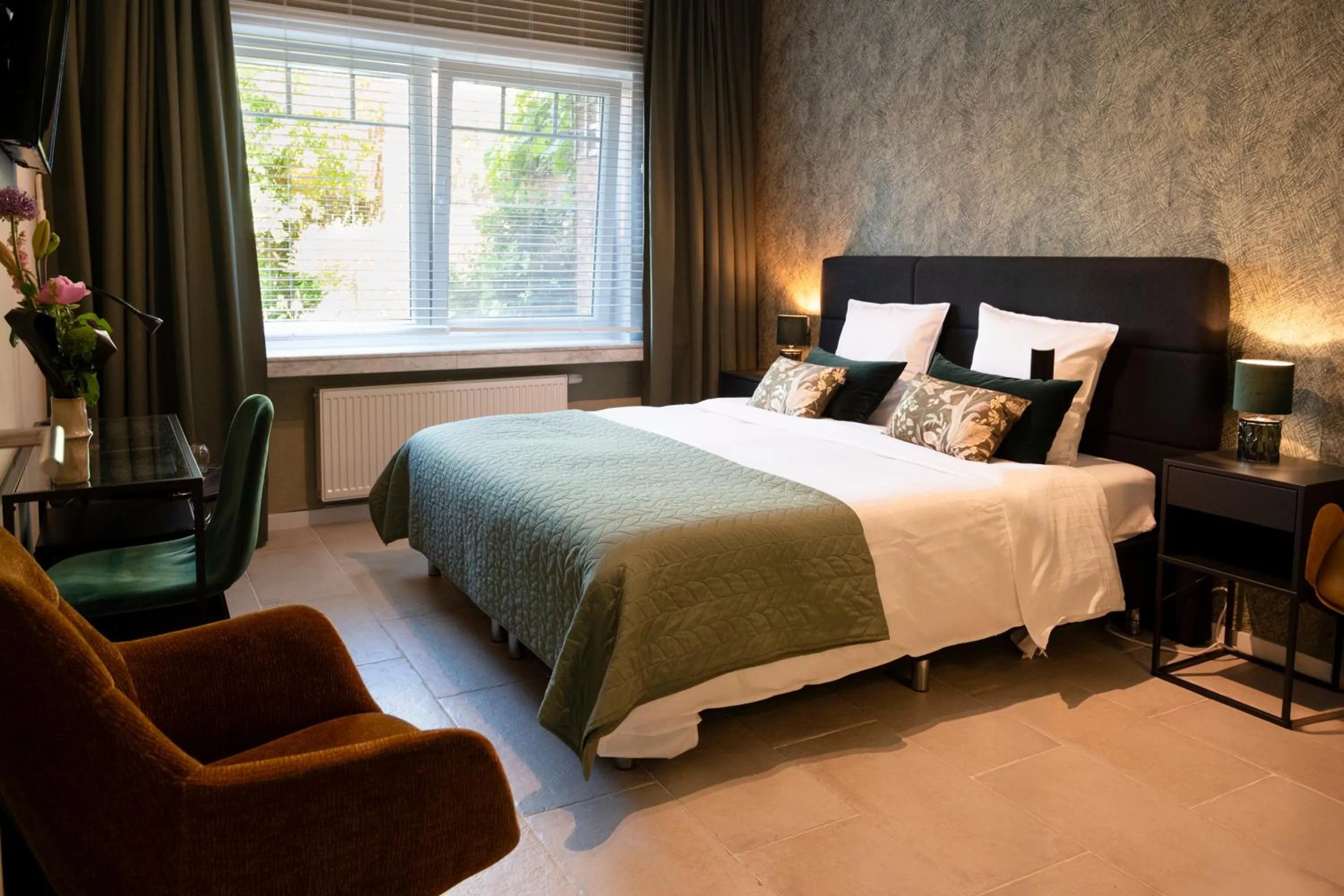 Bed in BnB De Koepoort