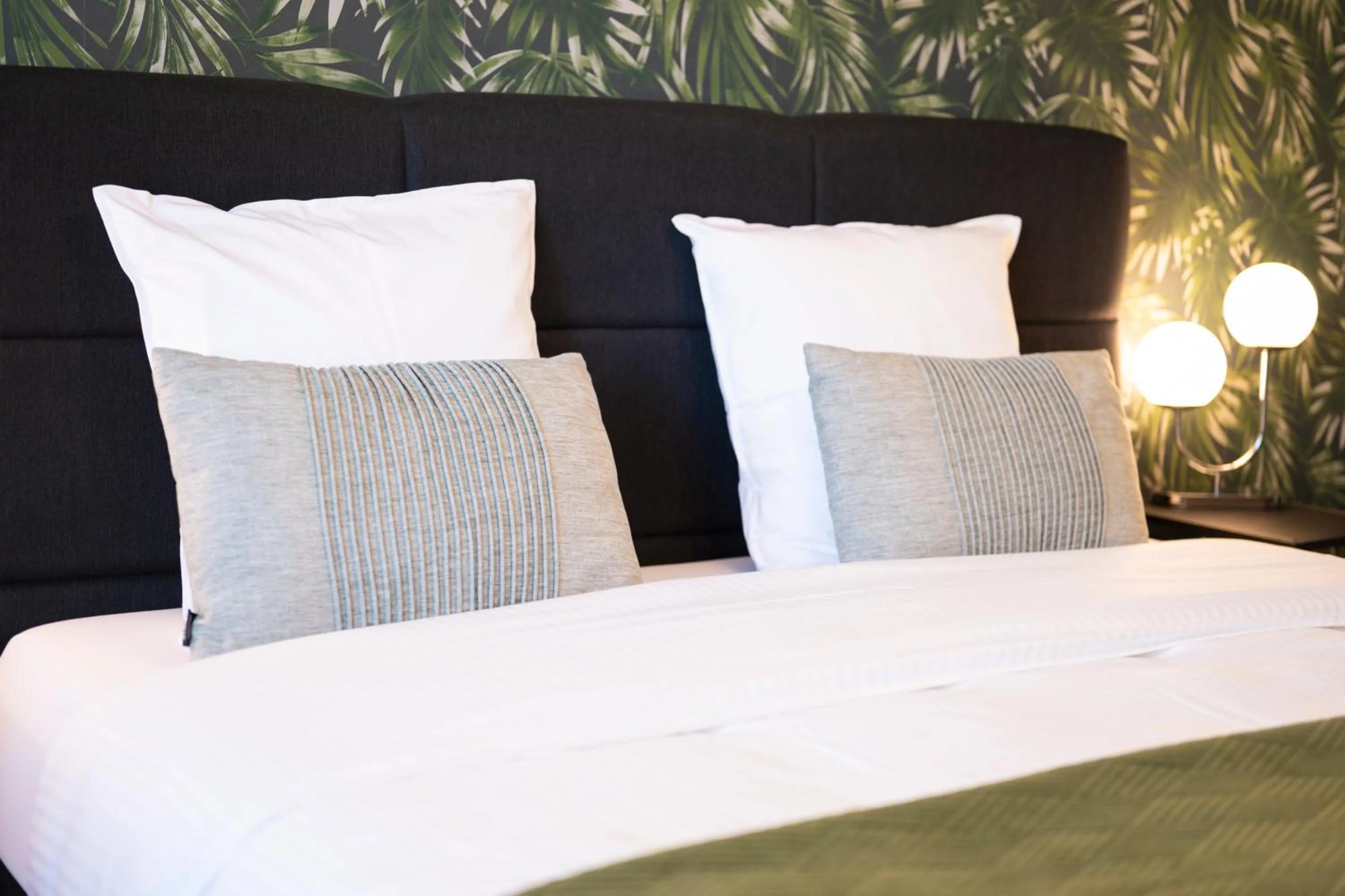 Bed in BnB De Koepoort