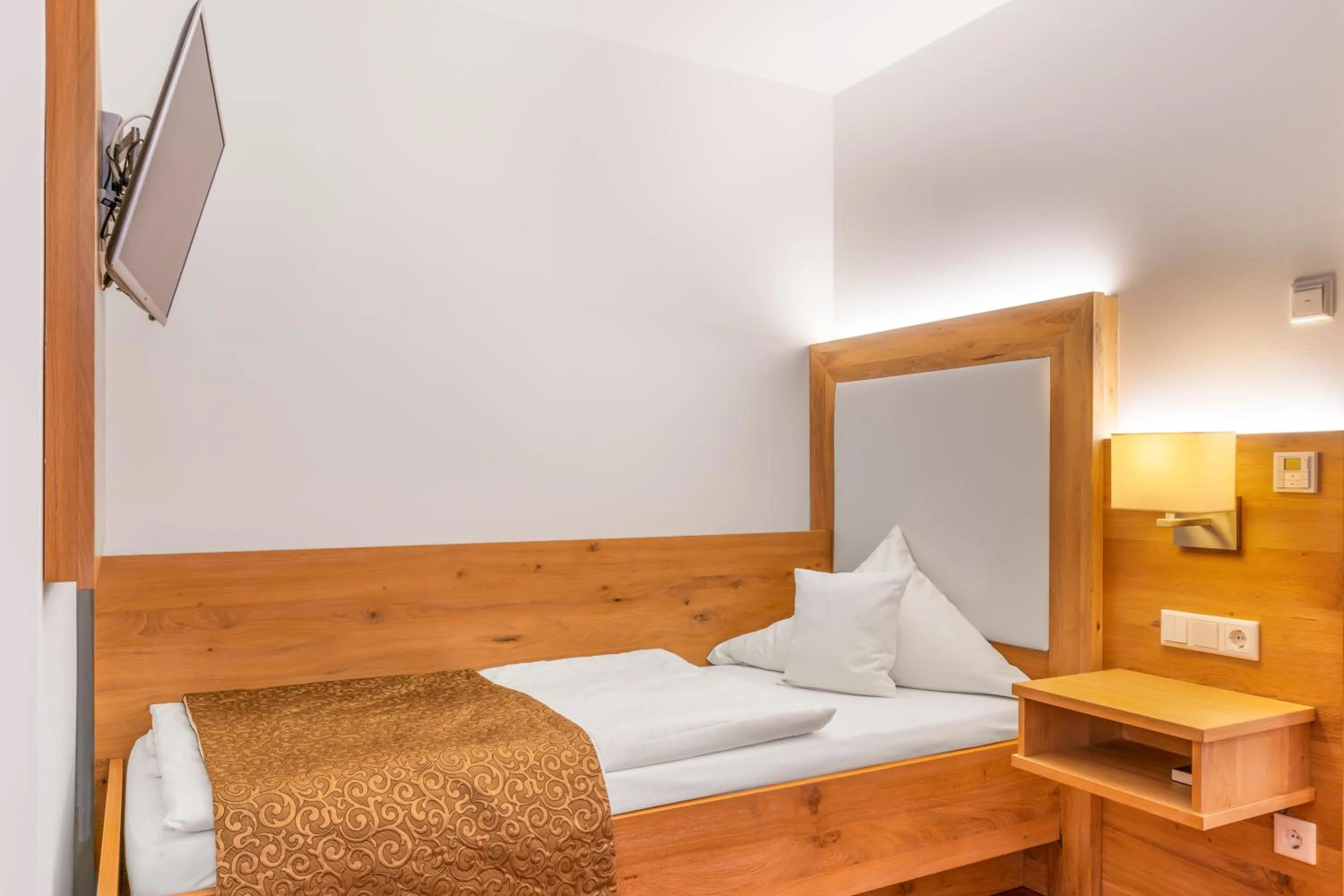 Photo of the whole room, Bed in Wander und Aktiv Hotel Rösslwirt