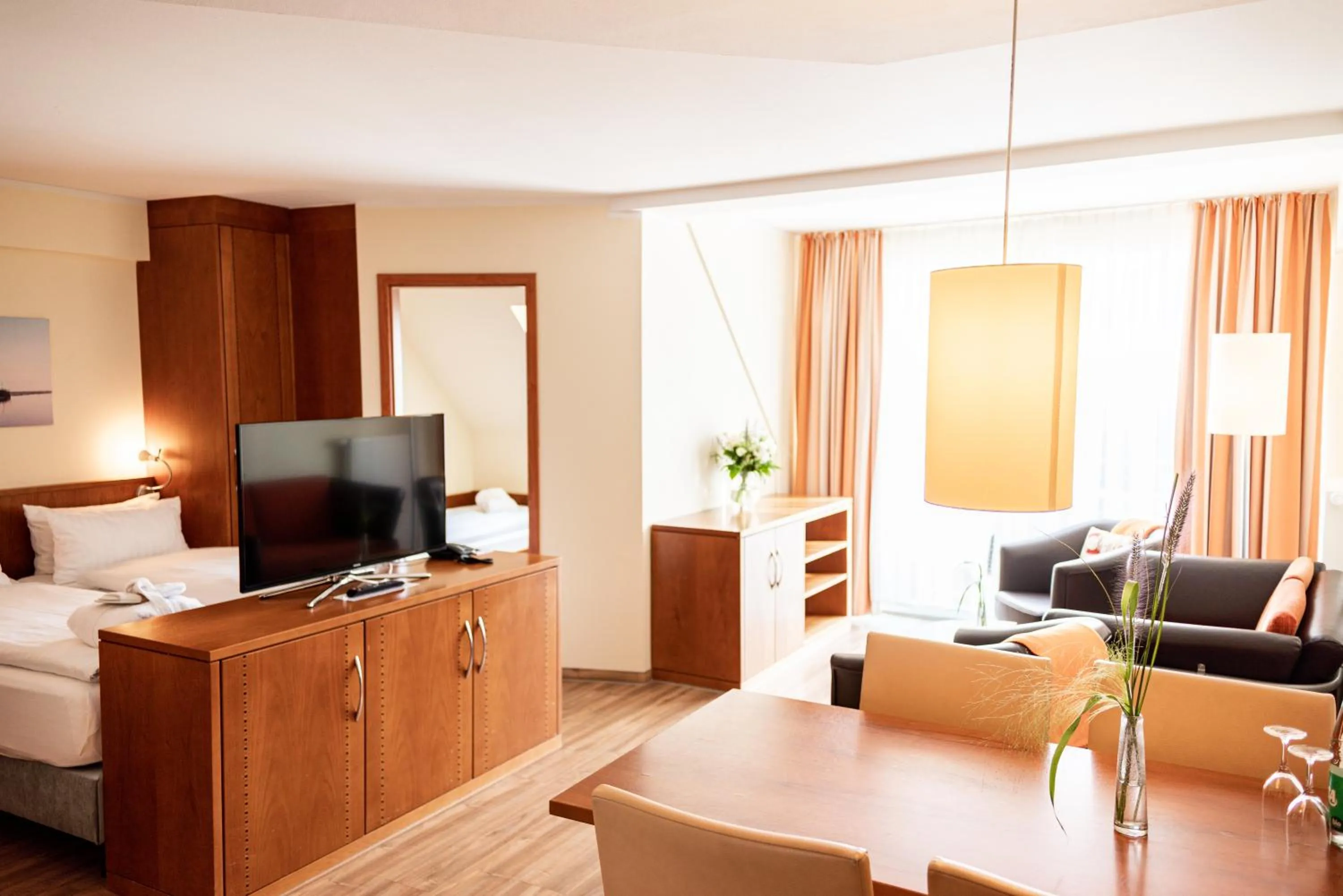 Living room, Bed in Hotel Atlantic Juist