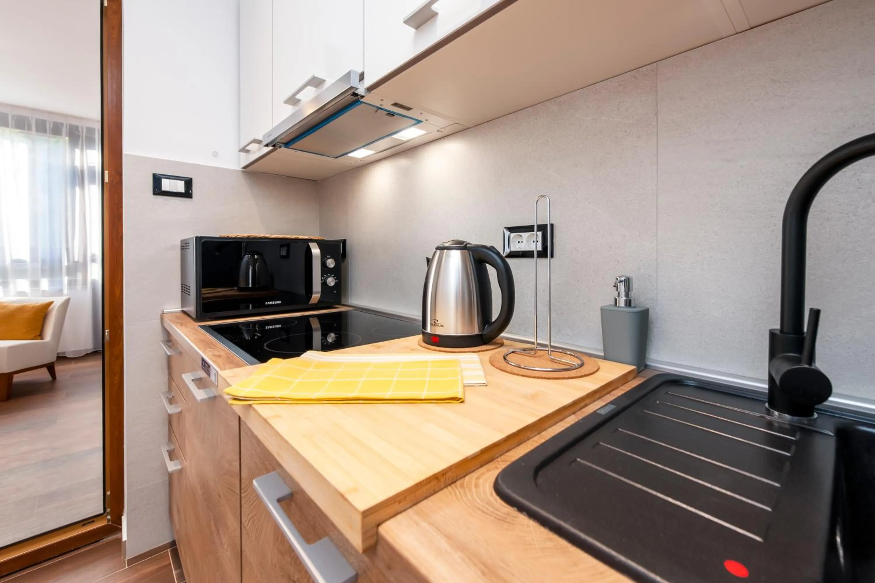 Kitchen or kitchenette in Apartments Sanja-New renovated