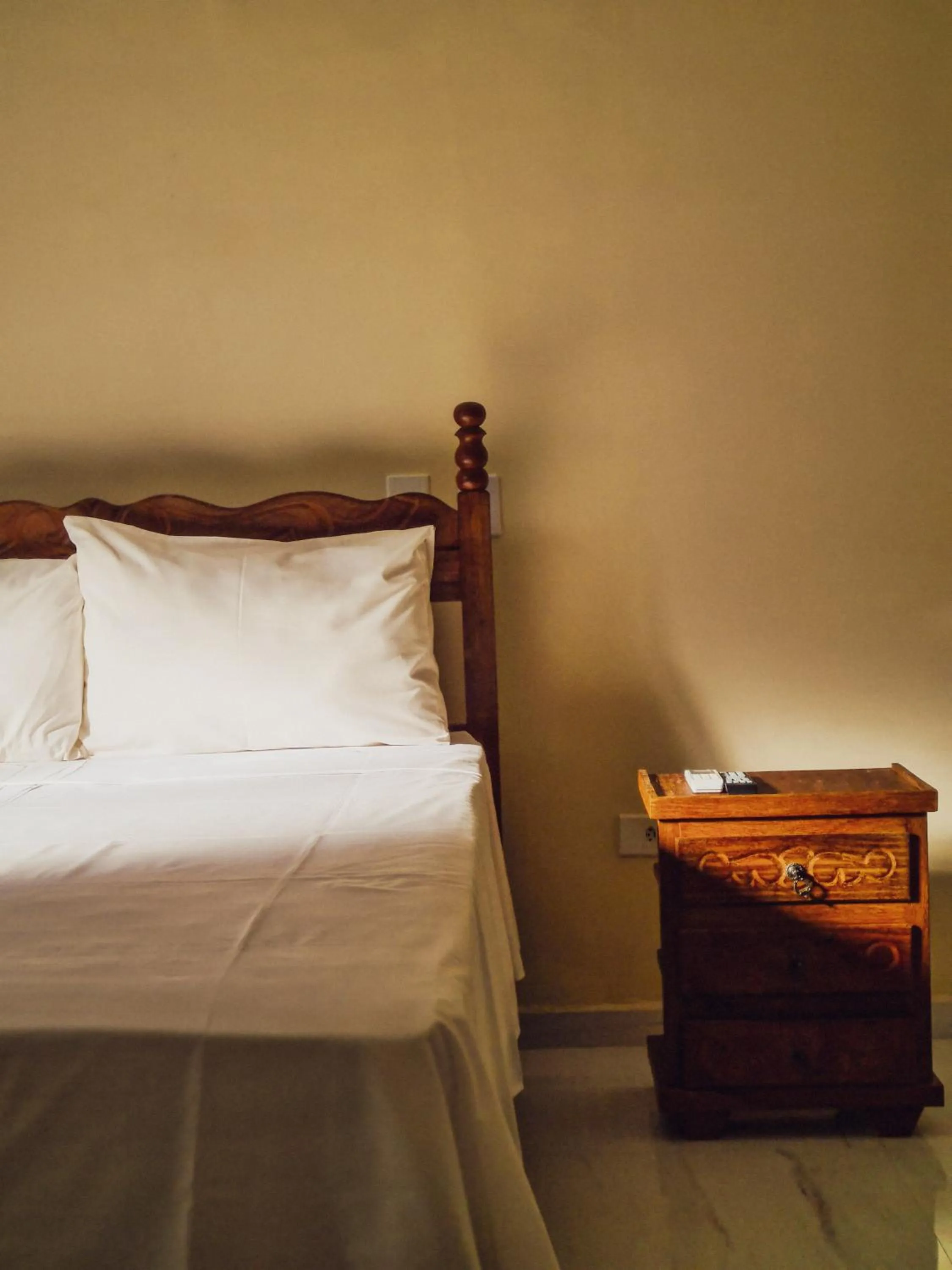 Bed in Vila Sancar Pousada