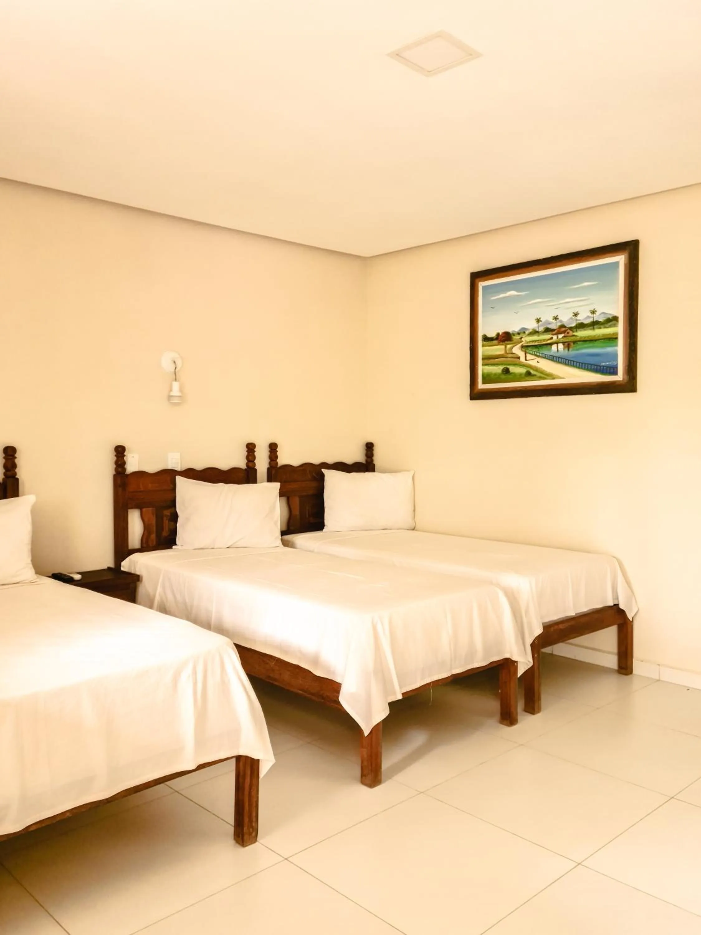 Bed in Vila Sancar Pousada