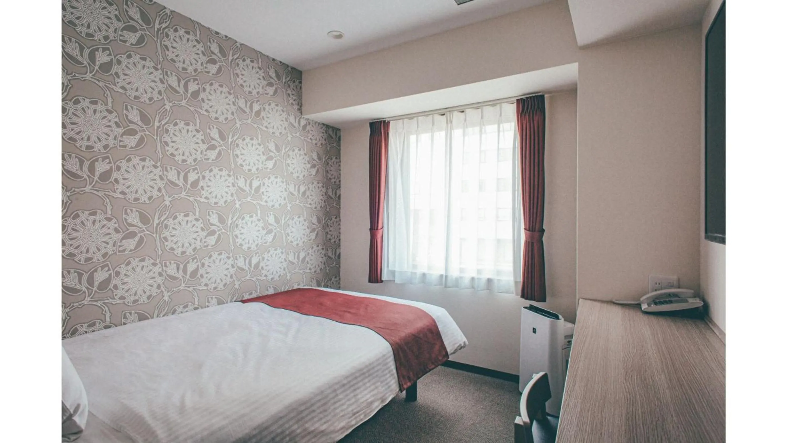 Bed in Kuretake Inn Premium Shizuoka Annex