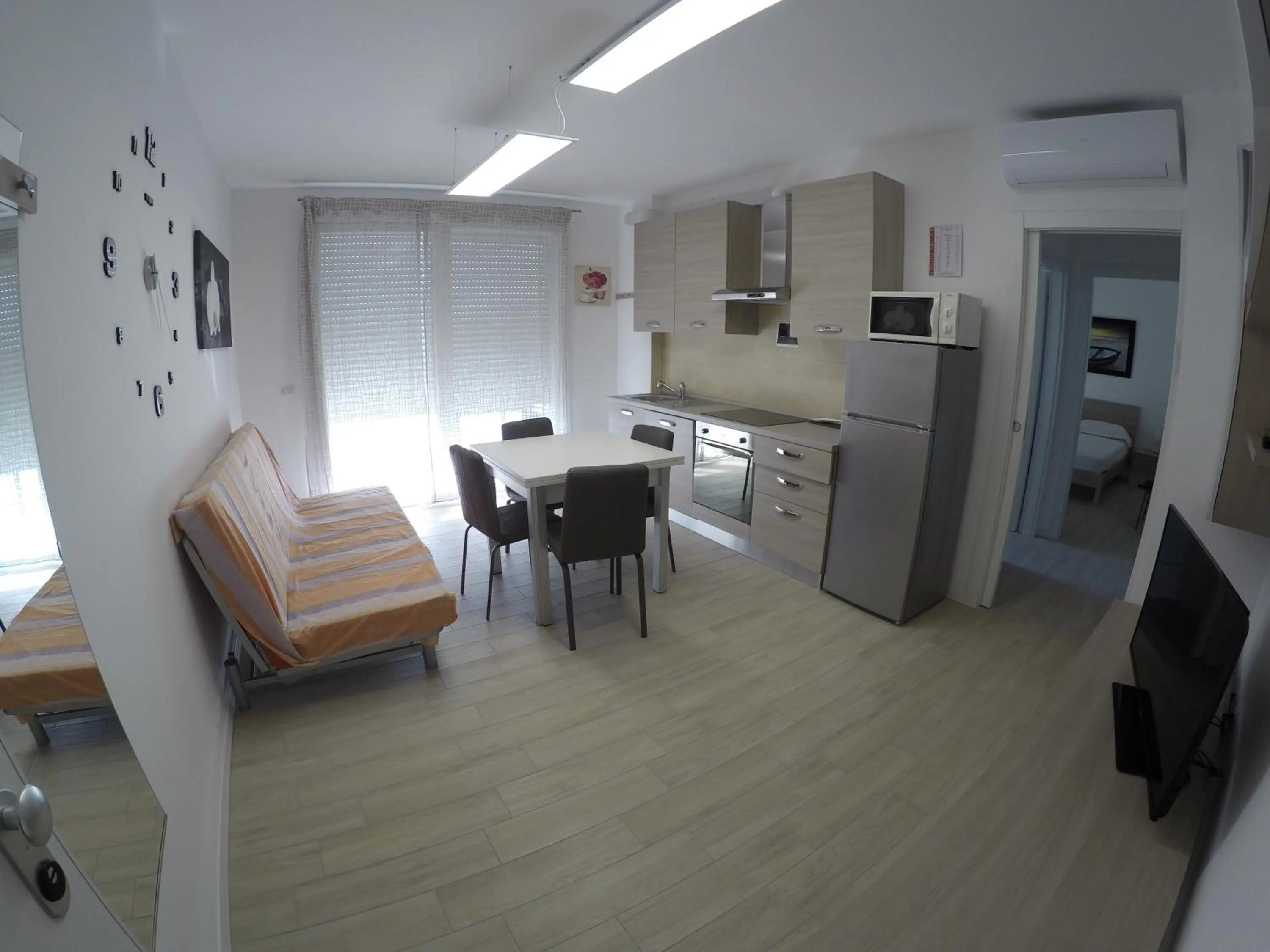 Kitchen or kitchenette in RESIDENCE CAORLE TRILOCALE CON PISCINA - Agenzia Cocal