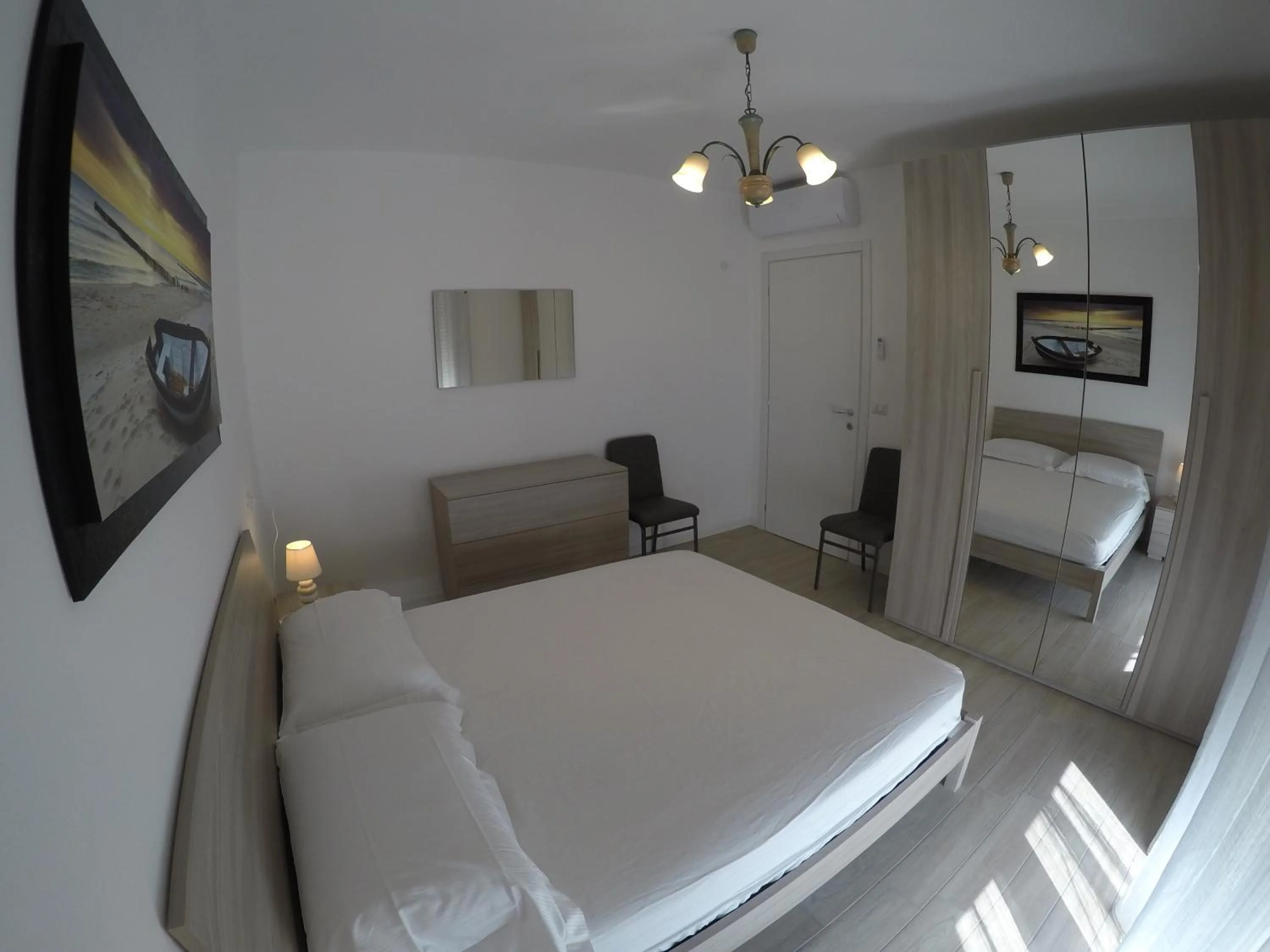 Bedroom, Bed in RESIDENCE CAORLE TRILOCALE CON PISCINA - Agenzia Cocal