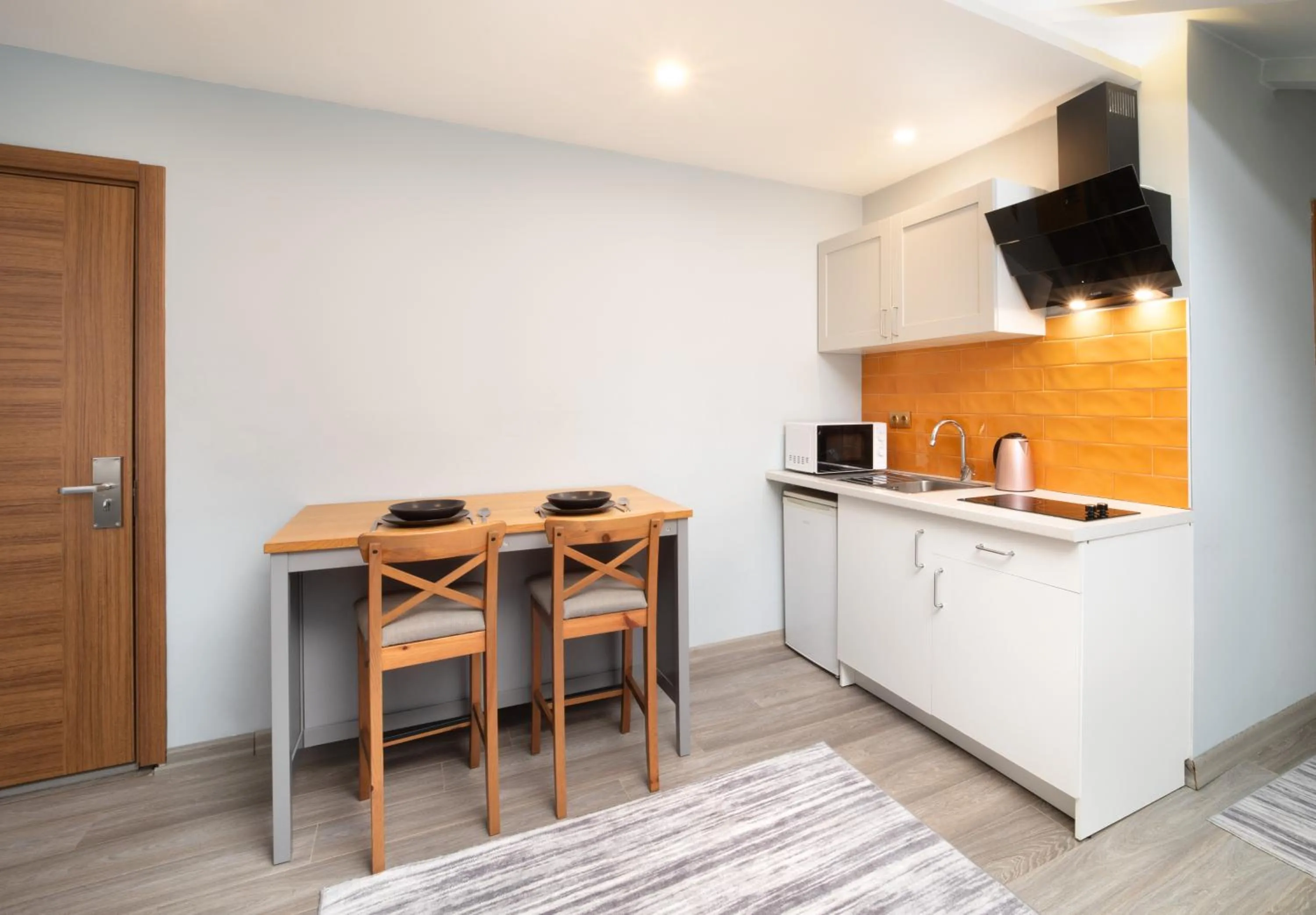 TV and multimedia in Family Time Suites Hotel