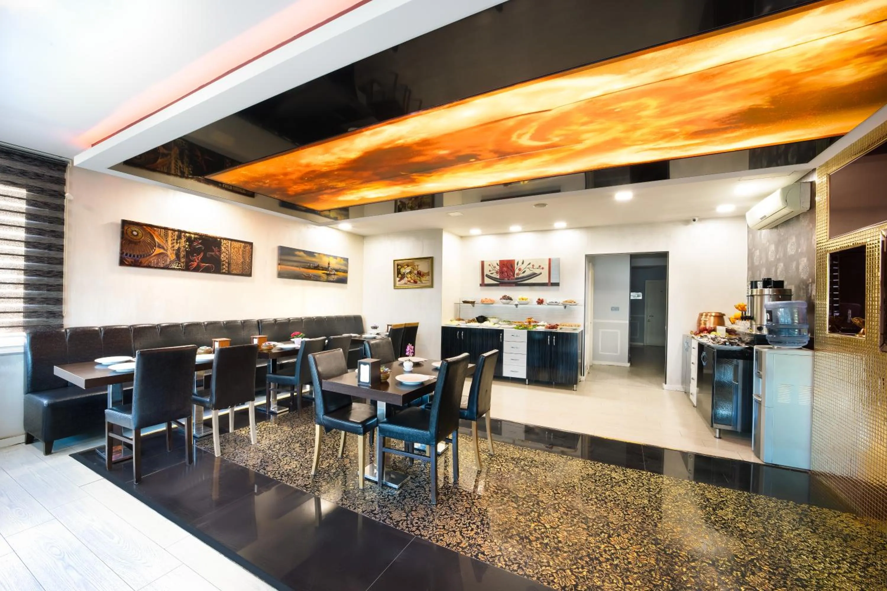 Dining area in Family Time Suites Hotel