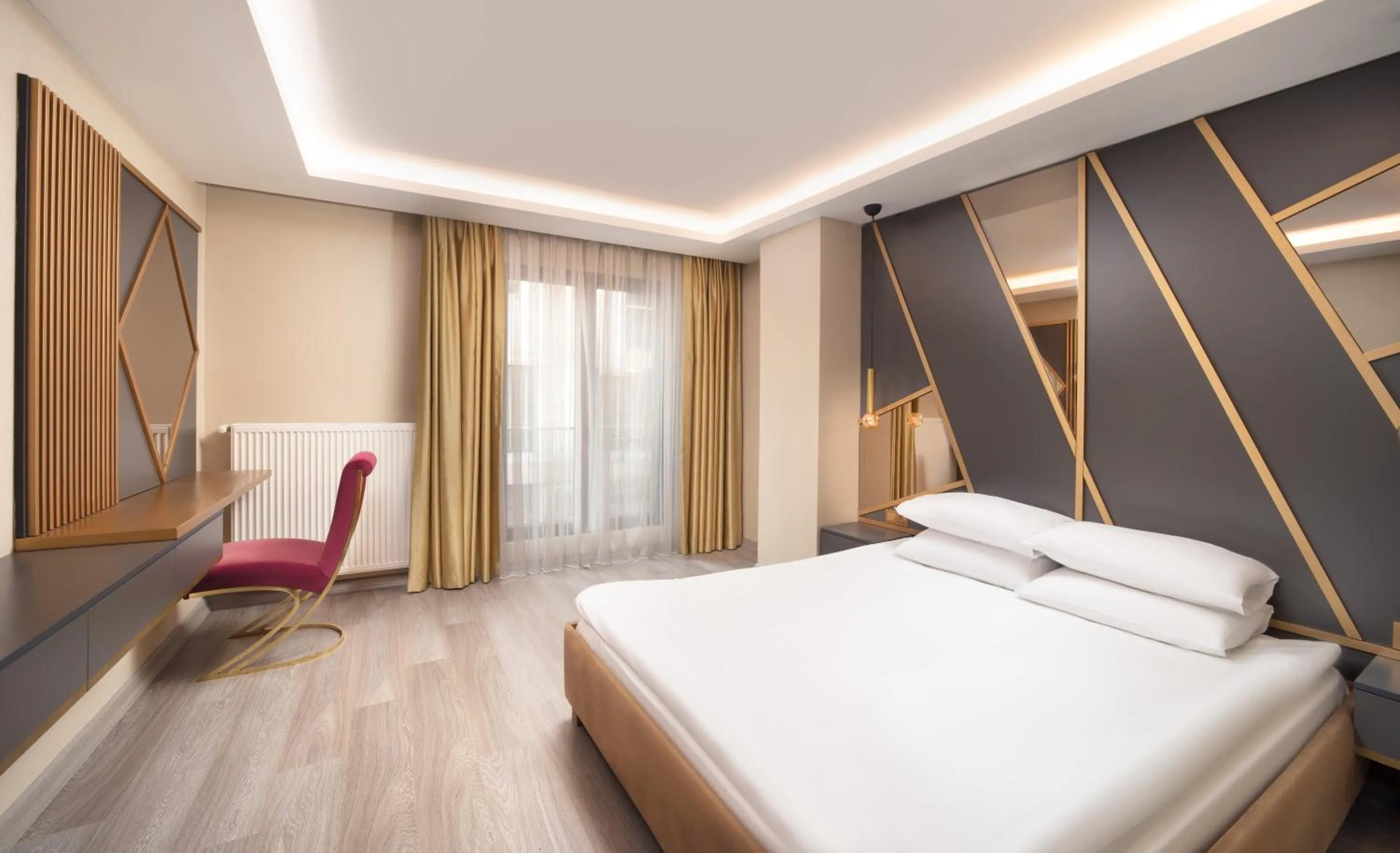 Bed in Family Time Suites Hotel