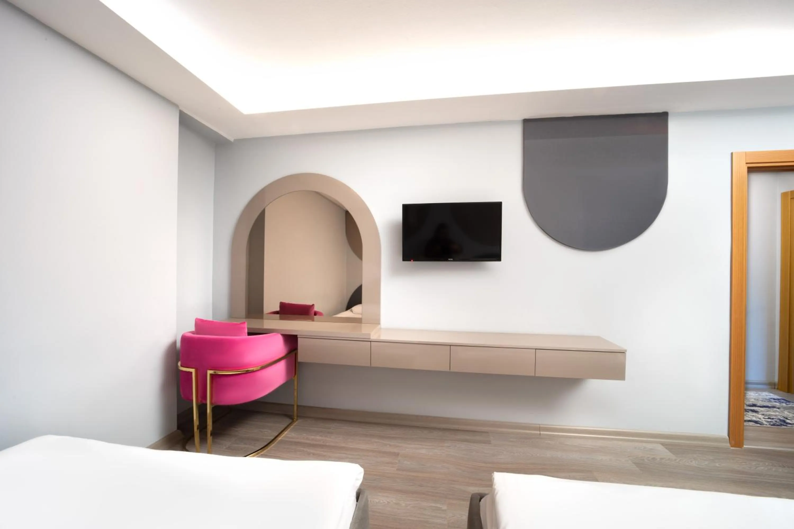 Bed in Family Time Suites Hotel