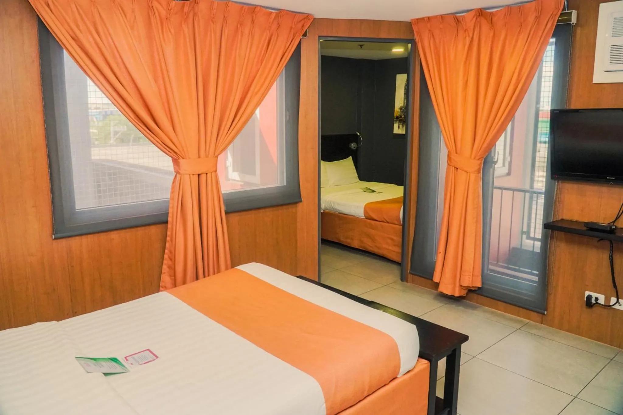 Bed in Jade Hotel and Suites