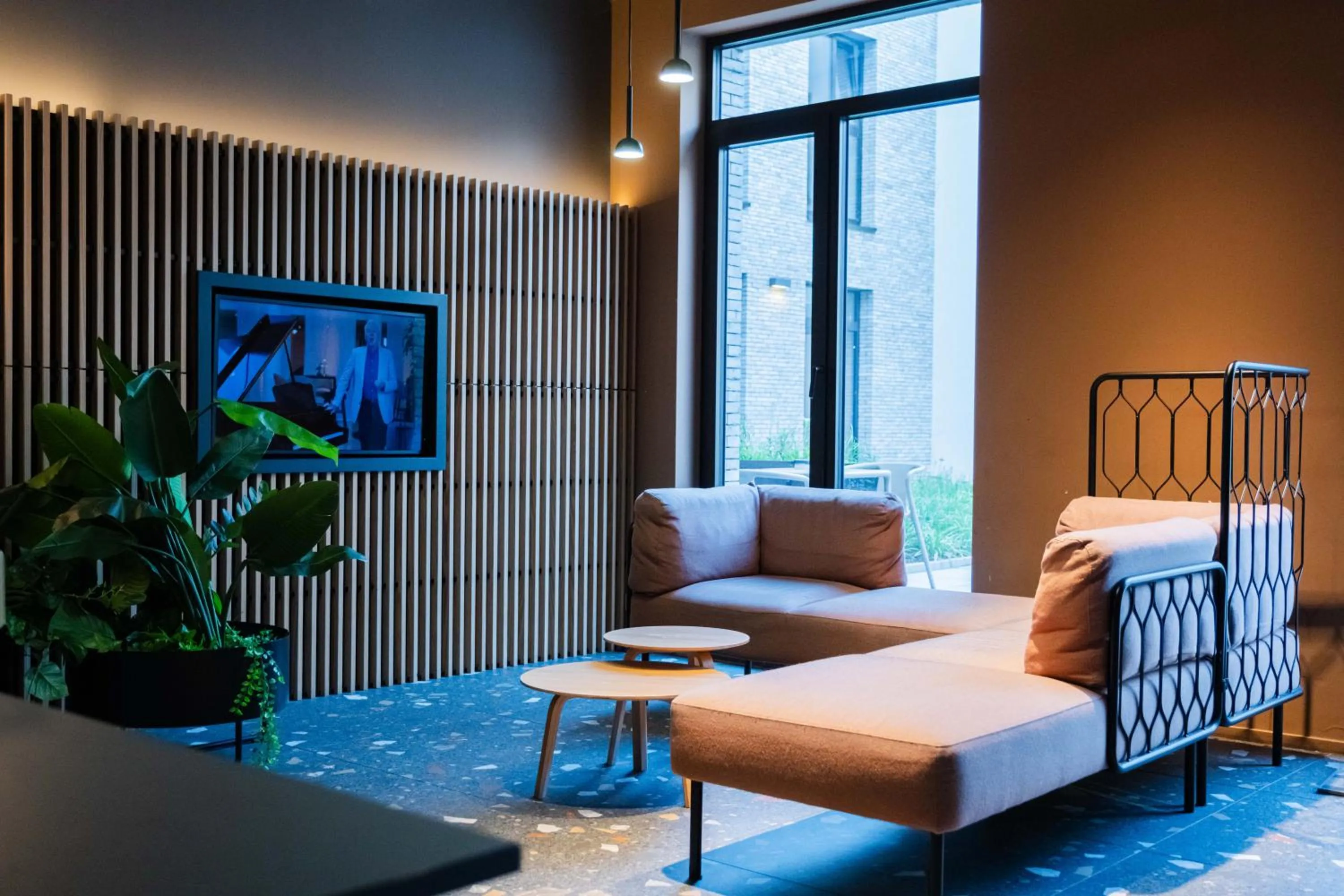 Communal lounge/ TV room, Bed in Citybox Antwerp City Center