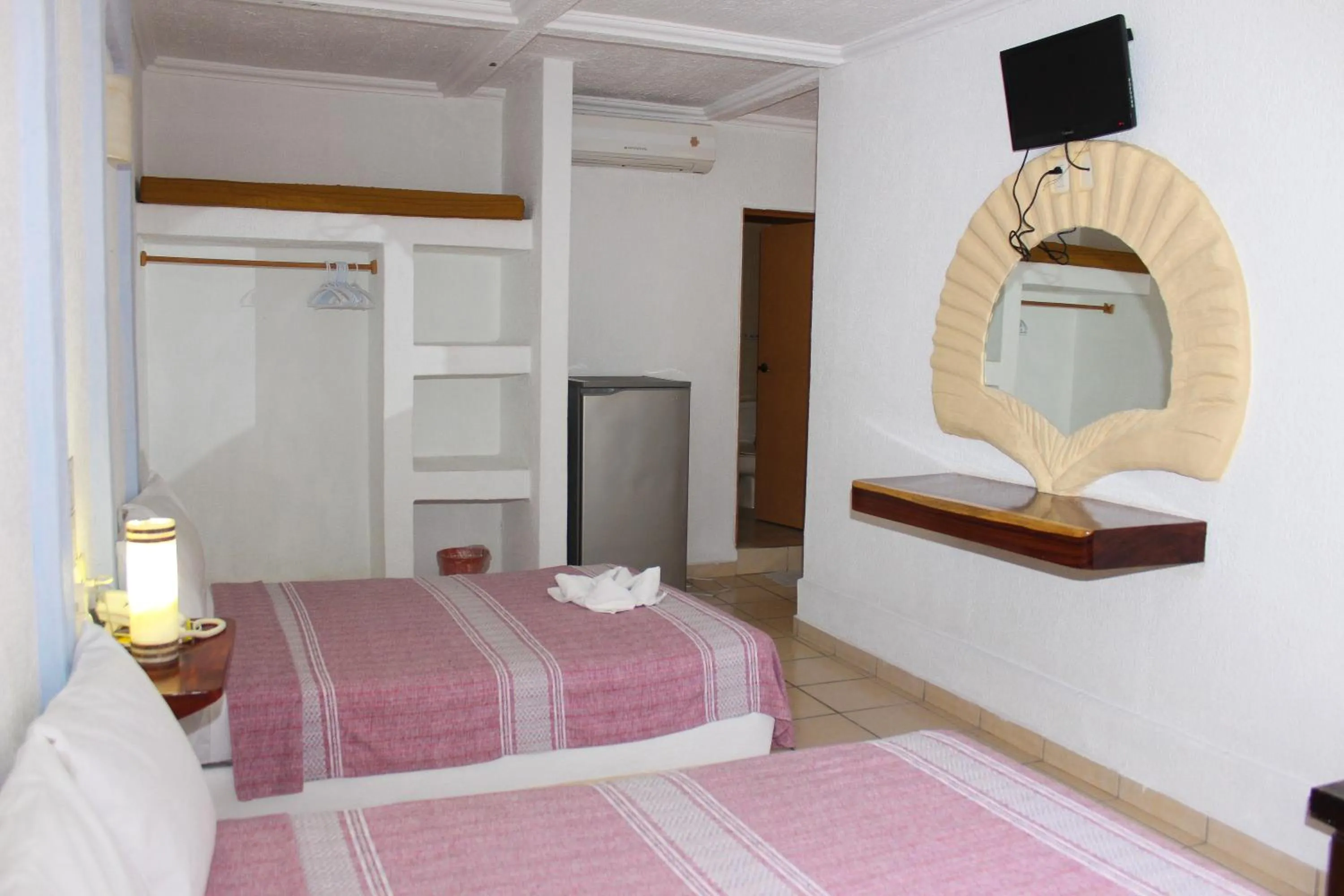 Bed in Hotel Careyes Puerto Escondido