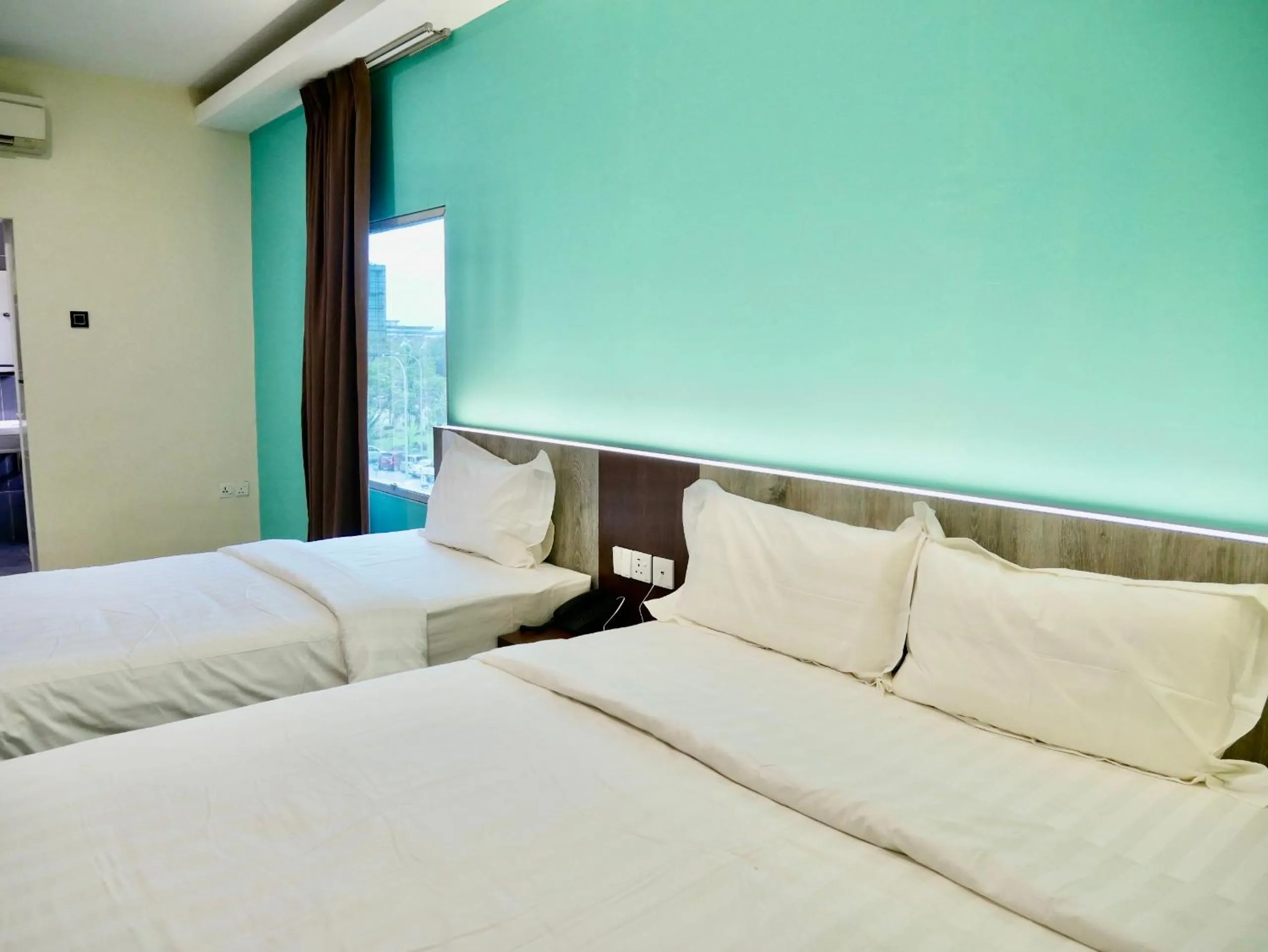 Photo of the whole room, Bed in Pantai Regal City Hotel