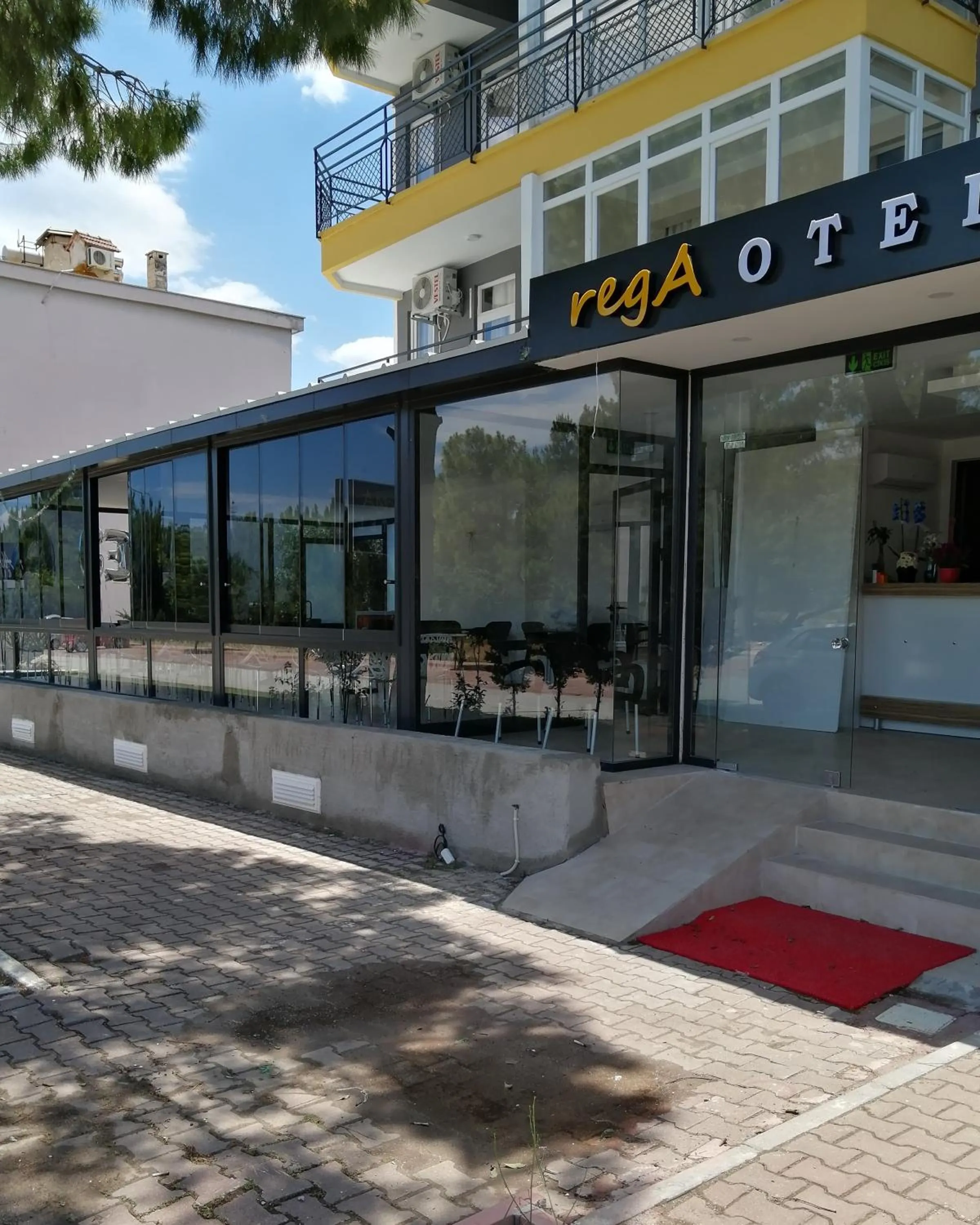 Facade/entrance in REGA OTEL