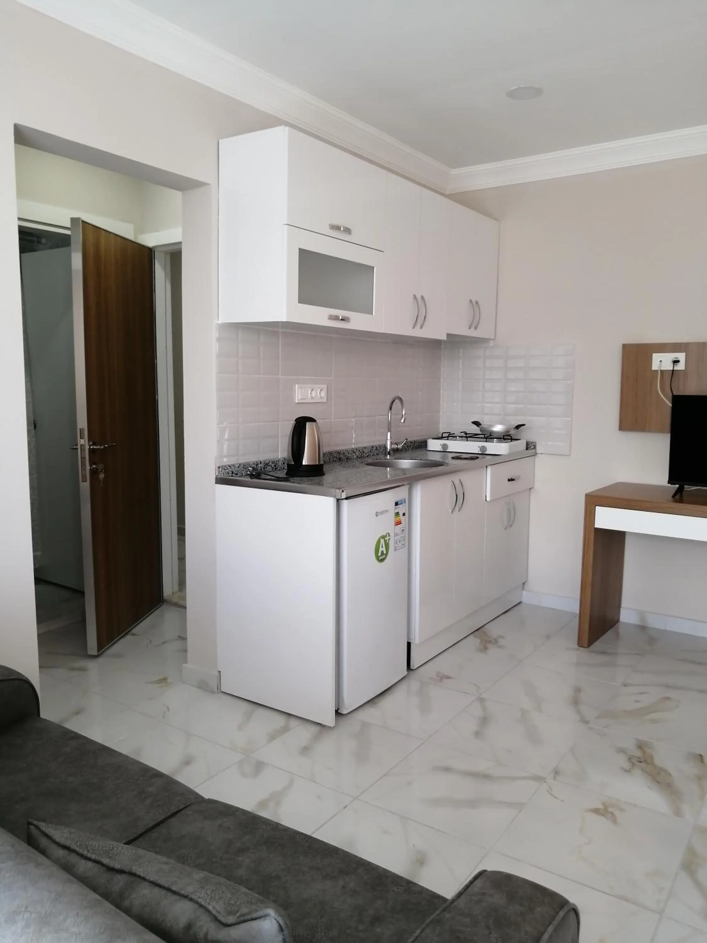 Kitchen or kitchenette in REGA OTEL