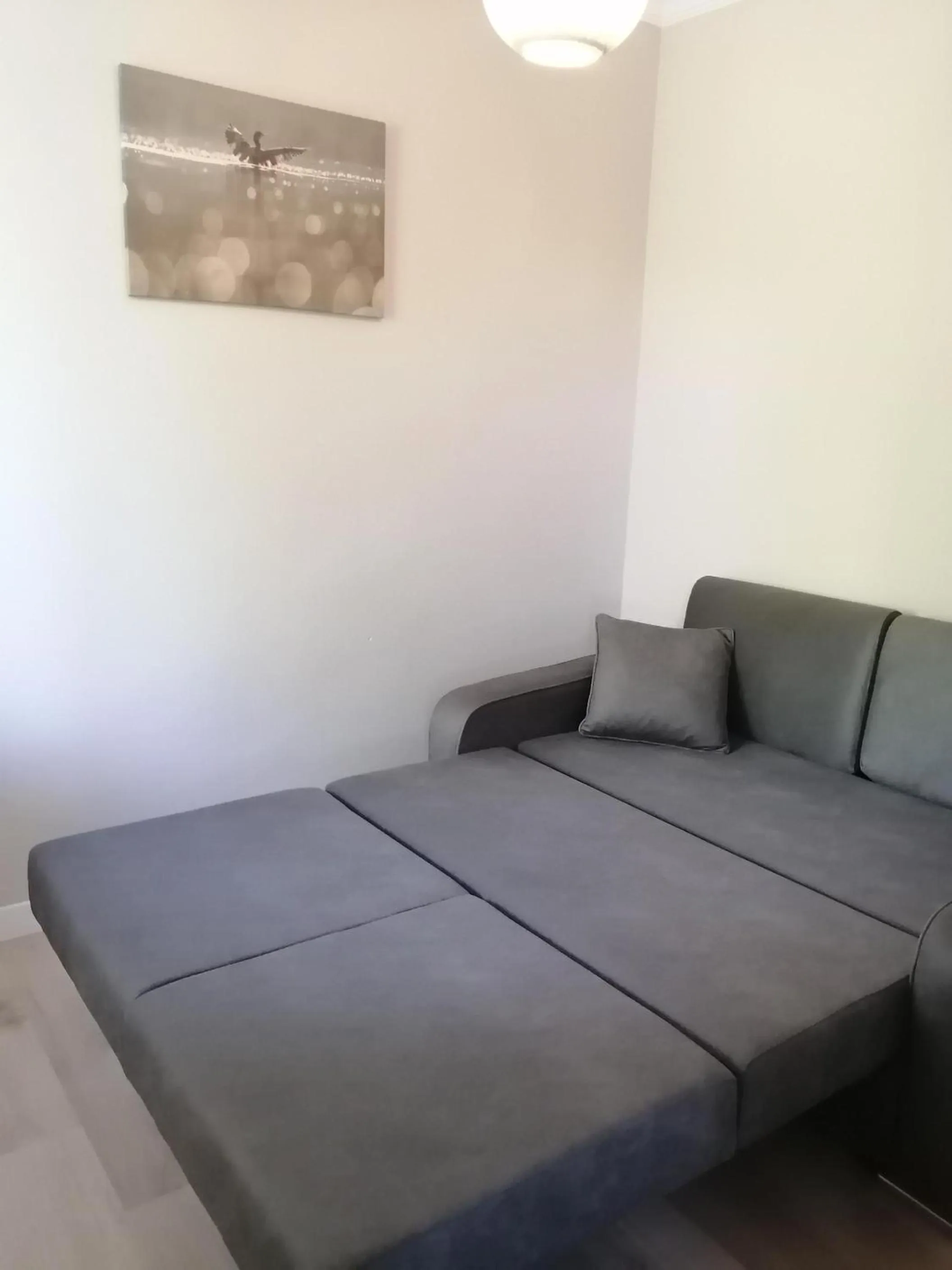 Seating area, Bed in REGA OTEL