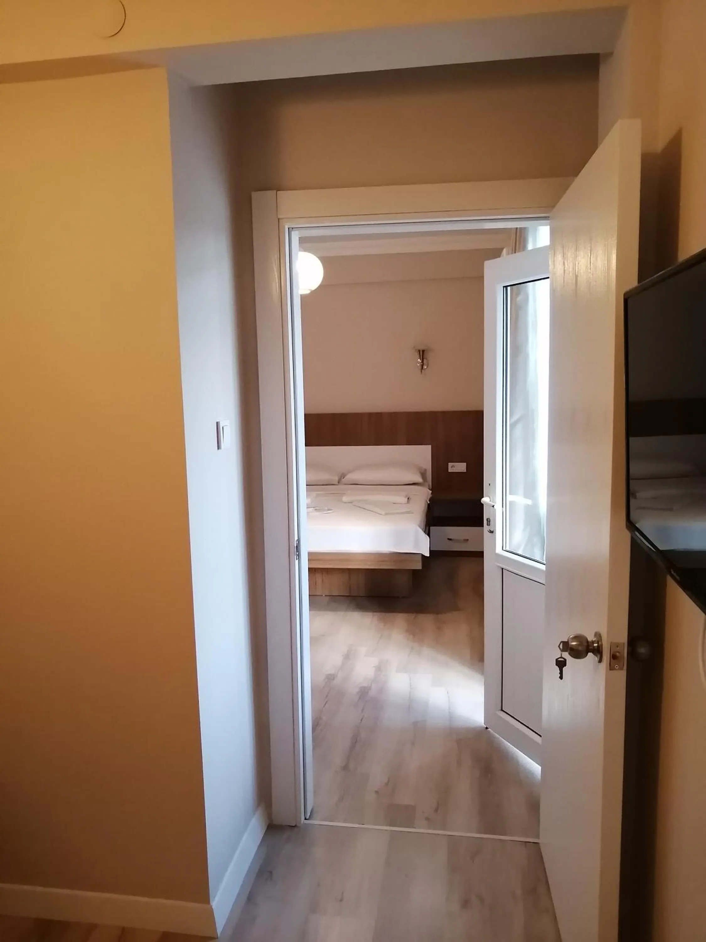 Seating area, Bed in REGA OTEL