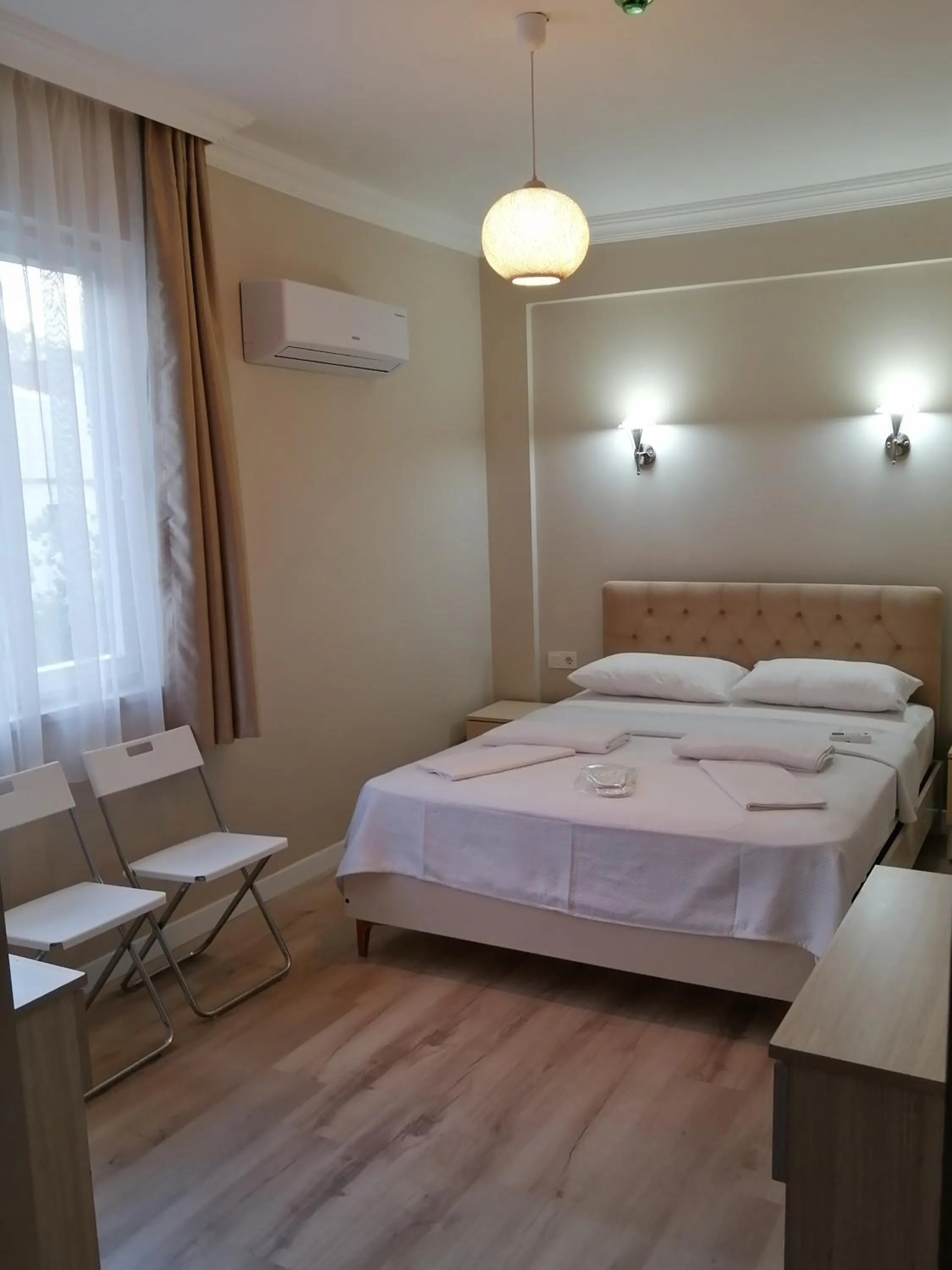 Photo of the whole room, Bed in REGA OTEL