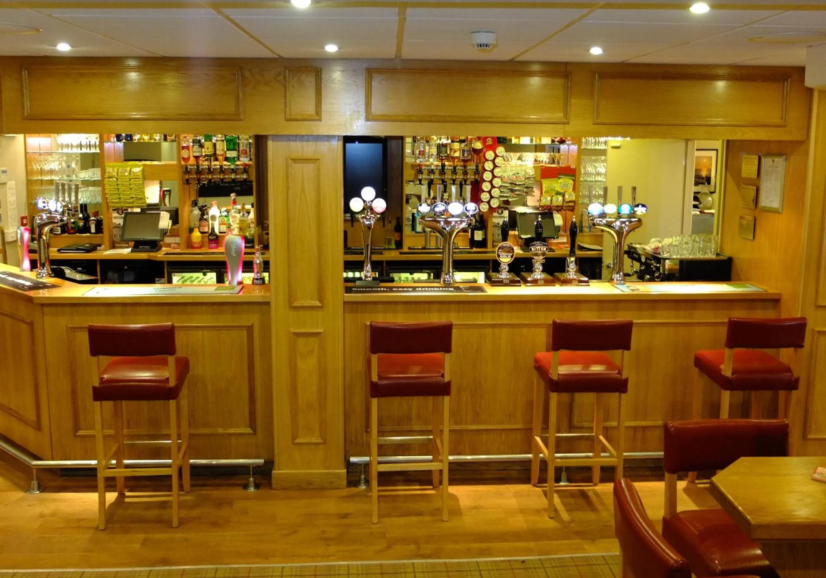Lounge or bar in The Golden Lion Hotel
